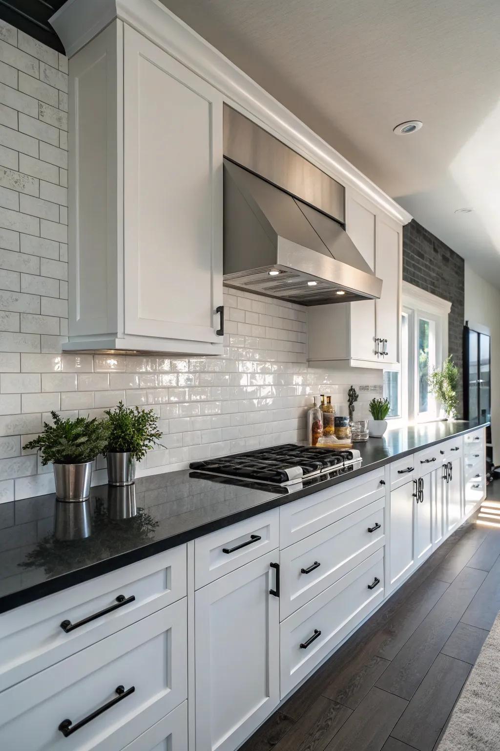 Stylish contrast featuring a white crystalized stone backsplash and dark cooking surfaces.