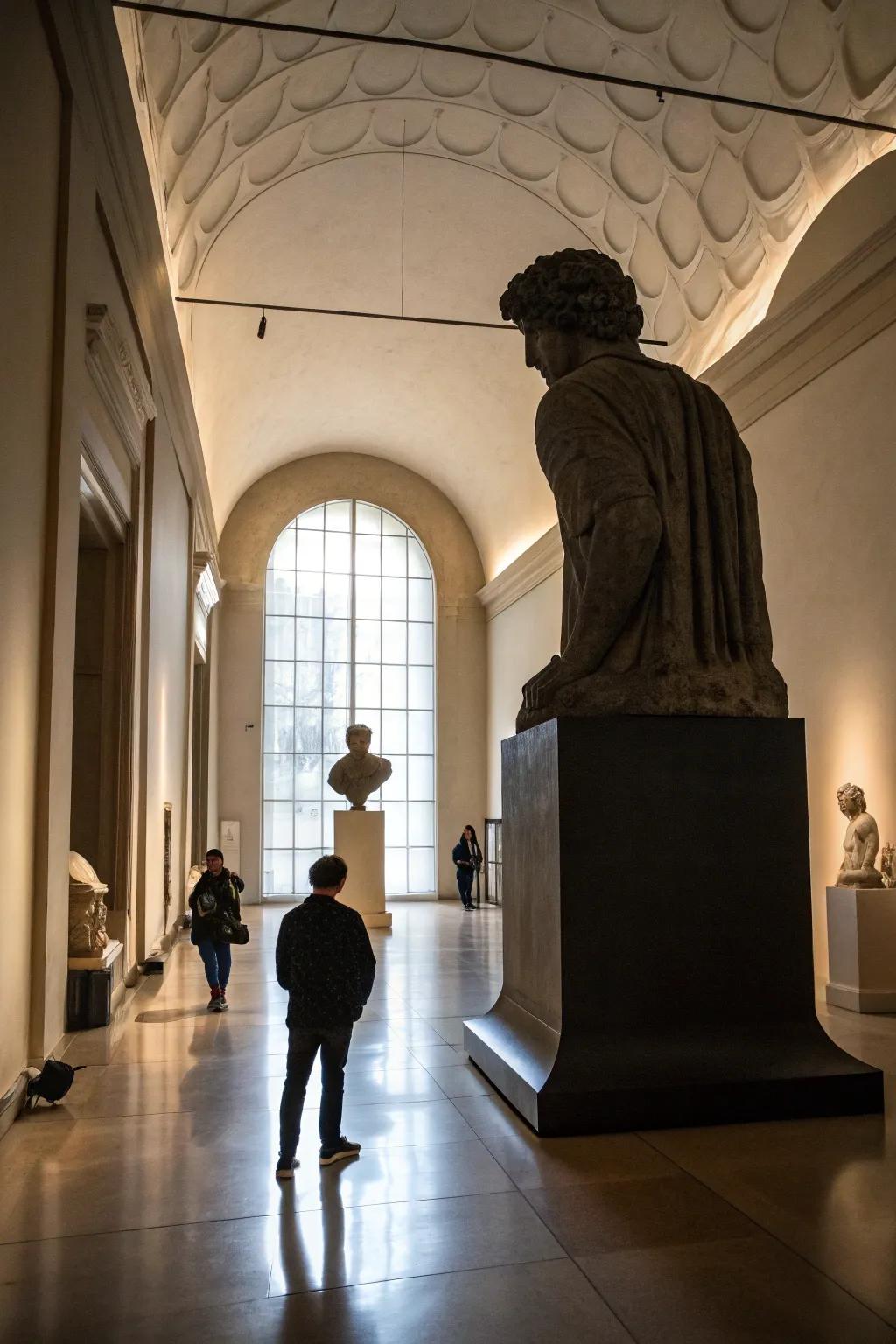 A room where a massive statue overshadows all the other decor elements.