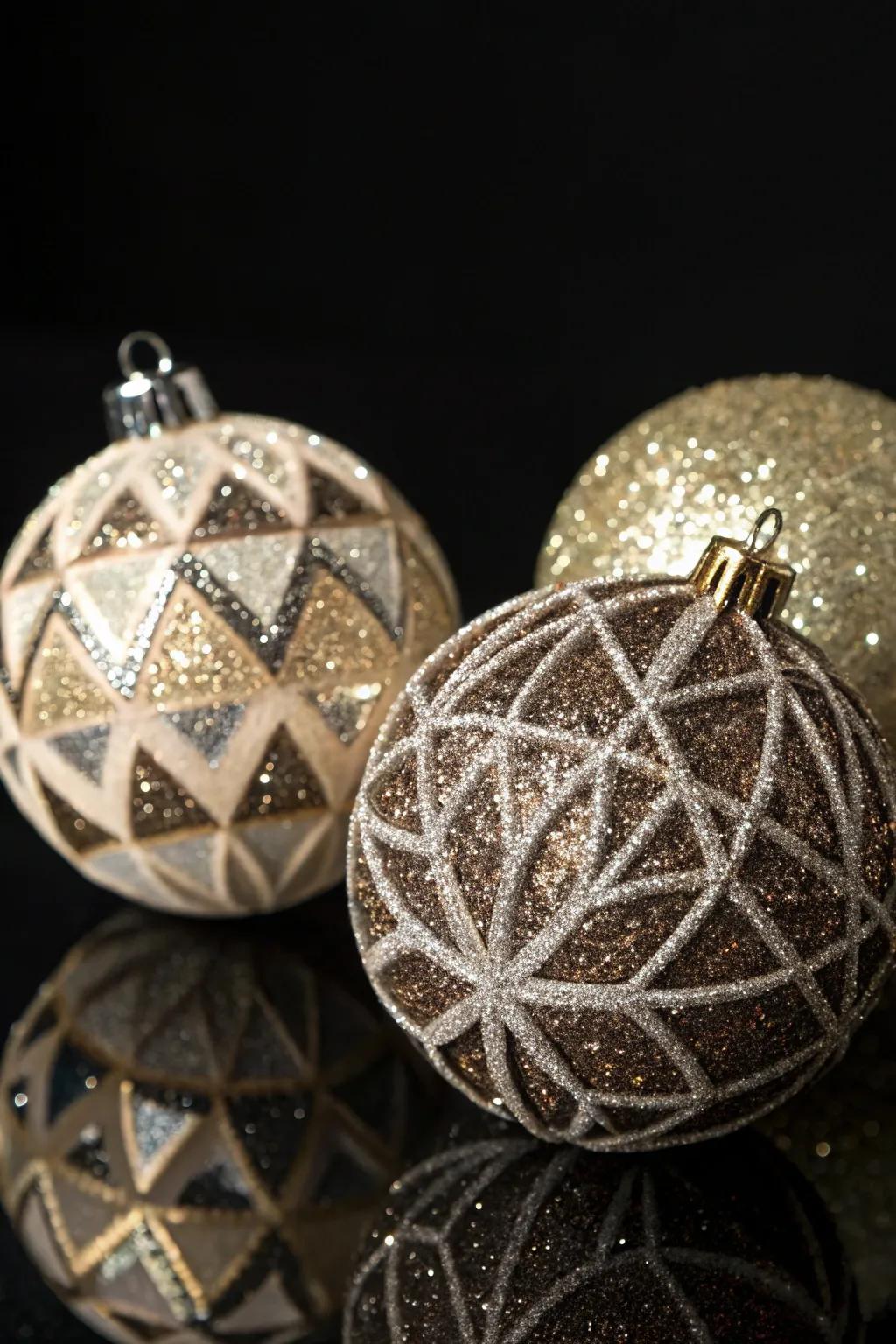 Geometric patterns with glitter add a modern sparkle to holiday ornaments.