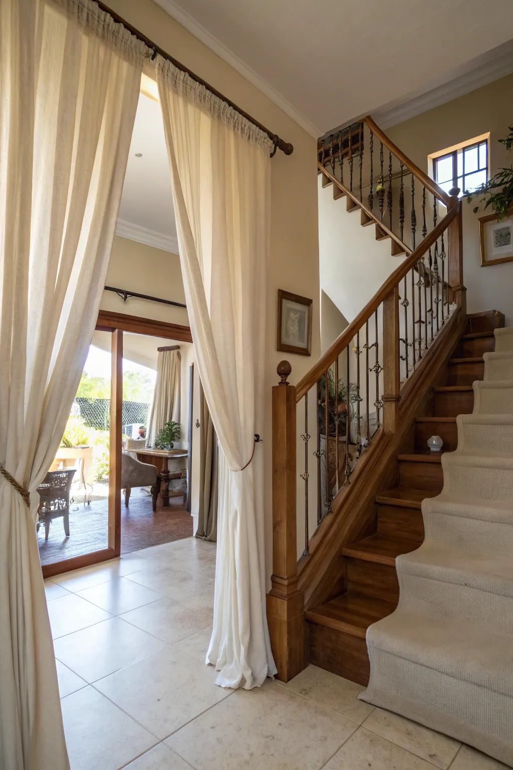 Window coverings can serve as stylish room dividers in your stairwell.