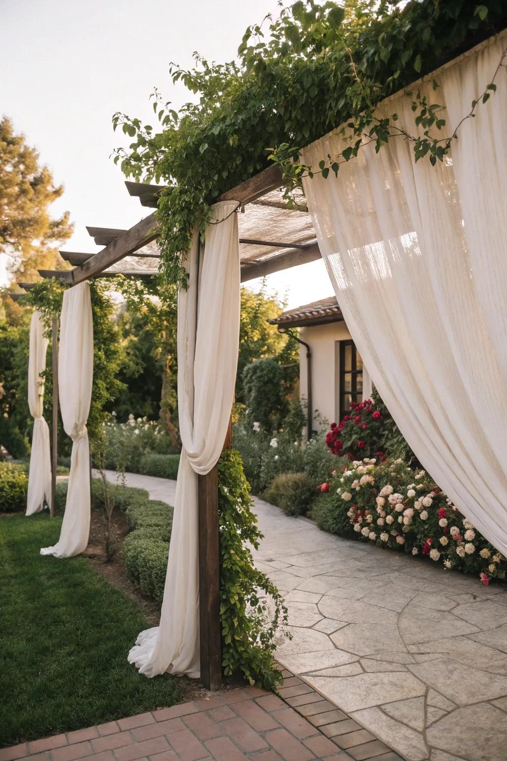 A bower with drapes adds sophistication and privacy.