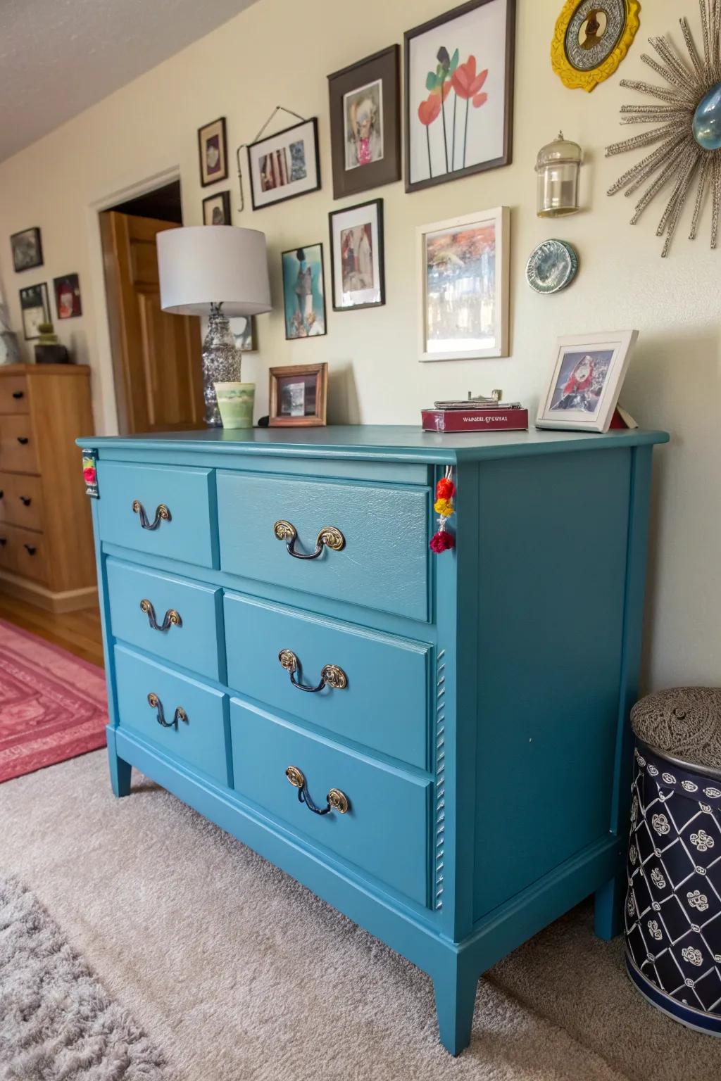 A blue dresser featuring individual hardware for a unique look.