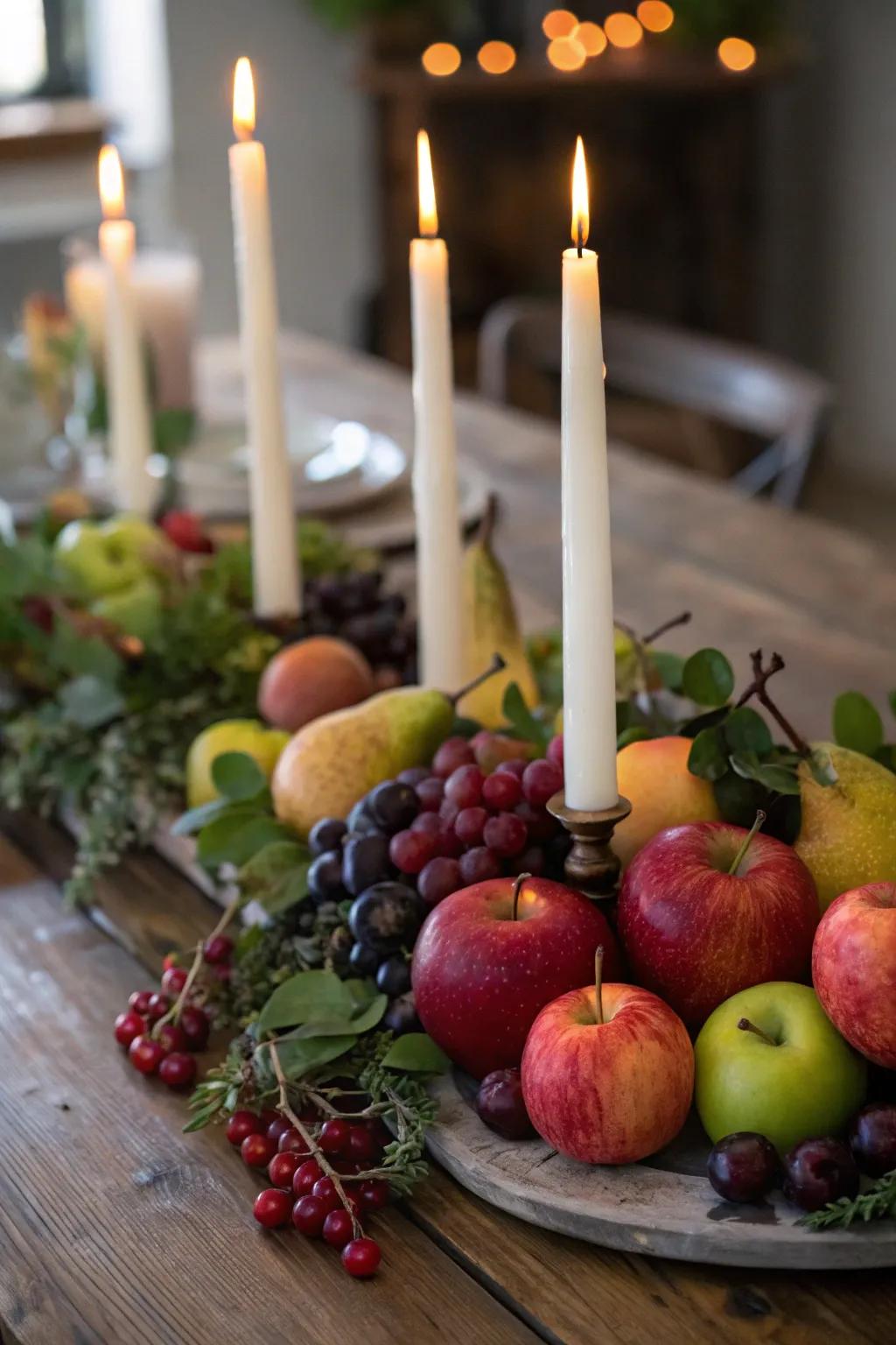A vibrant centerpiece combining wax lights and seasonal fruits.