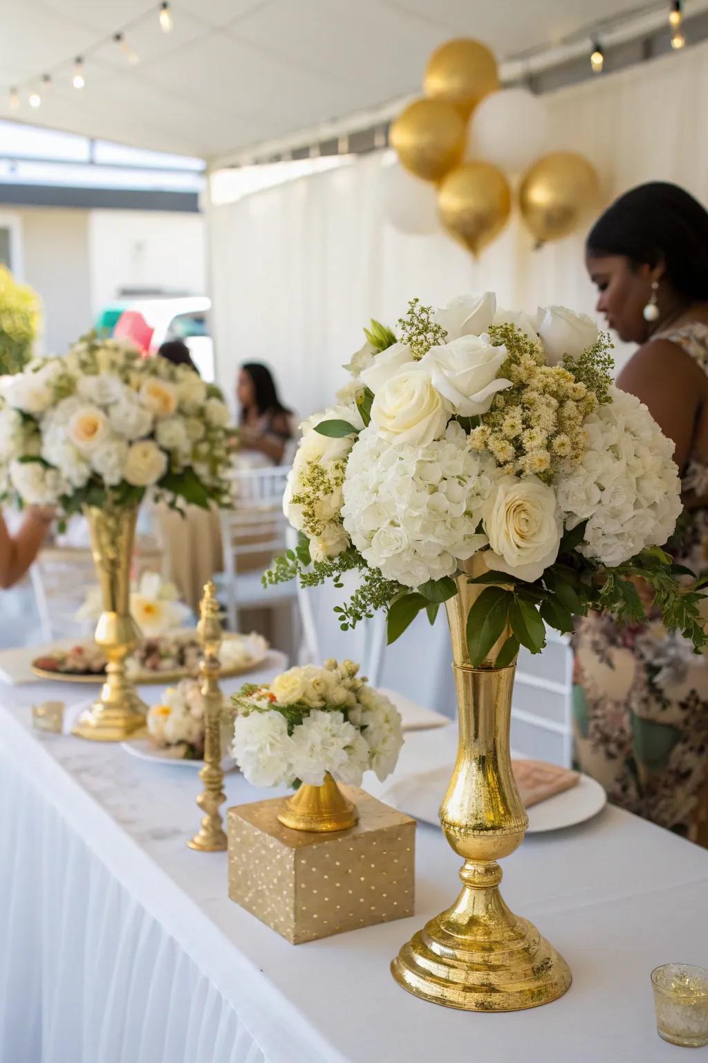 Sophisticated gold and white floral arrangements for added elegance.