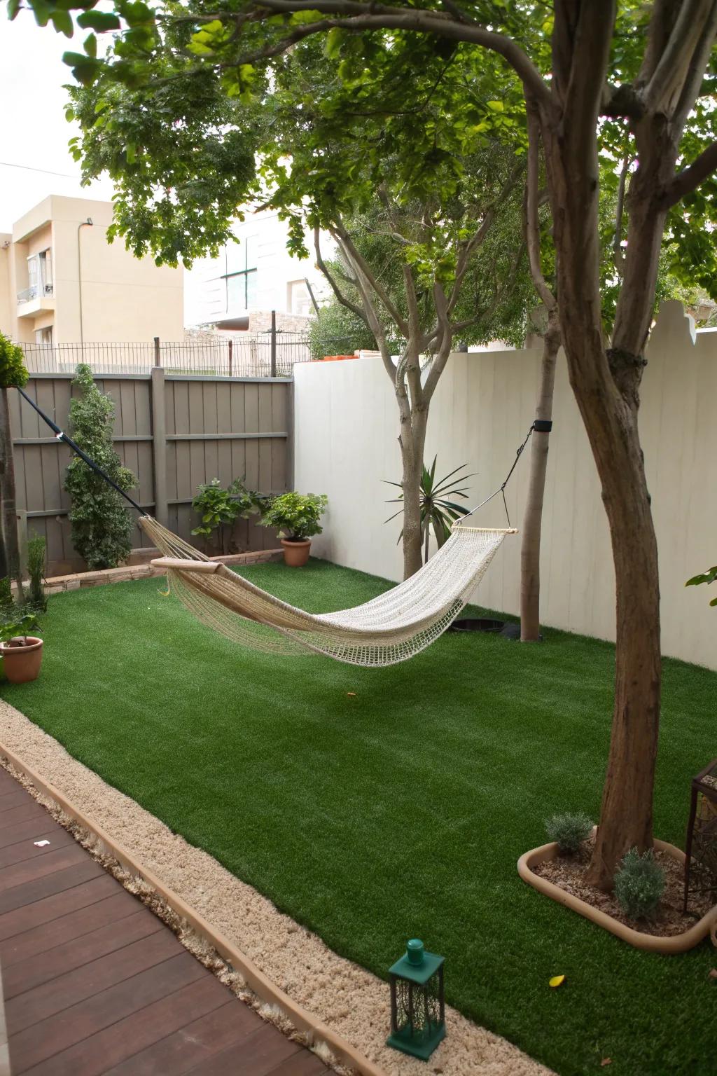 A hammock haven for relaxation over artificial turf.