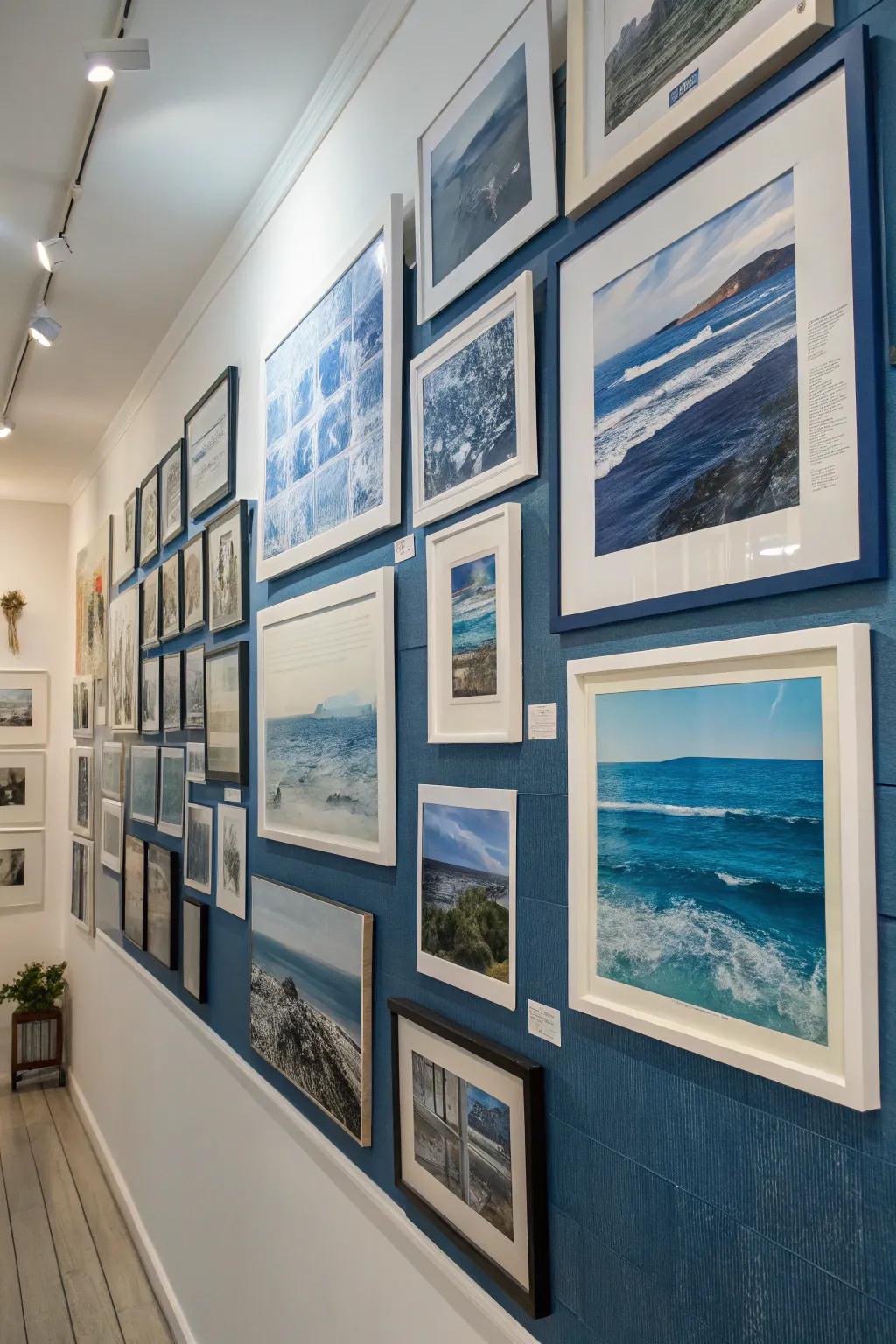 A gallery wall featuring azure-hued art includes a curated and personal touch.