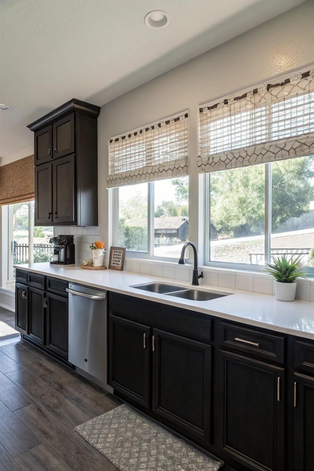 Dark cabinets highlighted by natural light for a warm and welcoming kitchen.