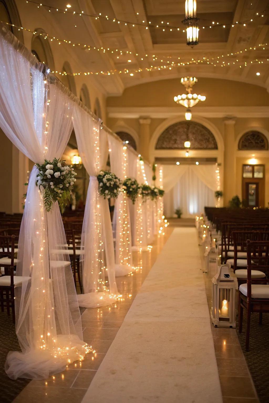 Netting and sparkle lights combine for a dreamy and radiant aisle.
