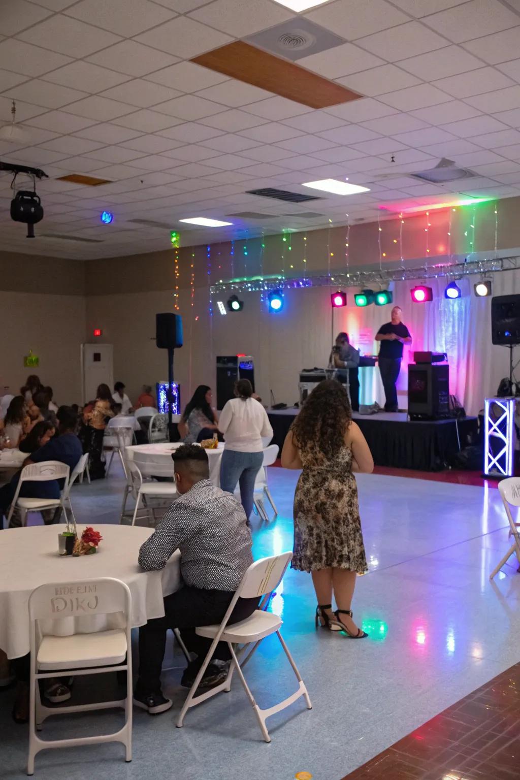 An energetic indoor celebration featuring a music and dance area.