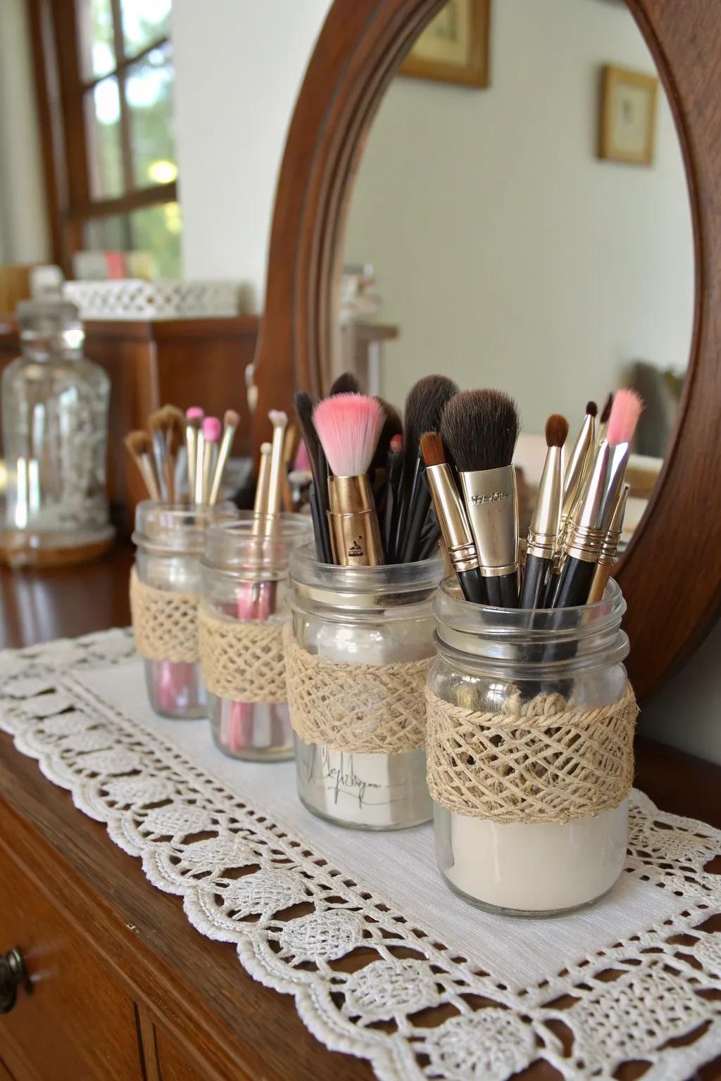 Glass preserving jars introduce shabby chic elegance to makeup brush keeping.