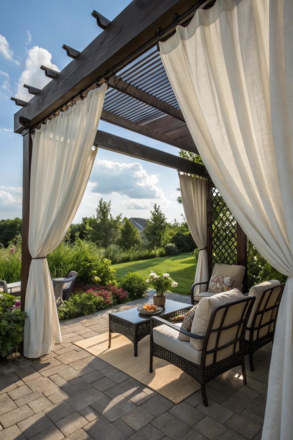 Outdoor drapery creates a comfortable, private space.