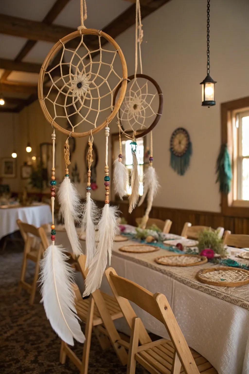 Dream catchers adding a bohemian touch to the countryside wedding setting.