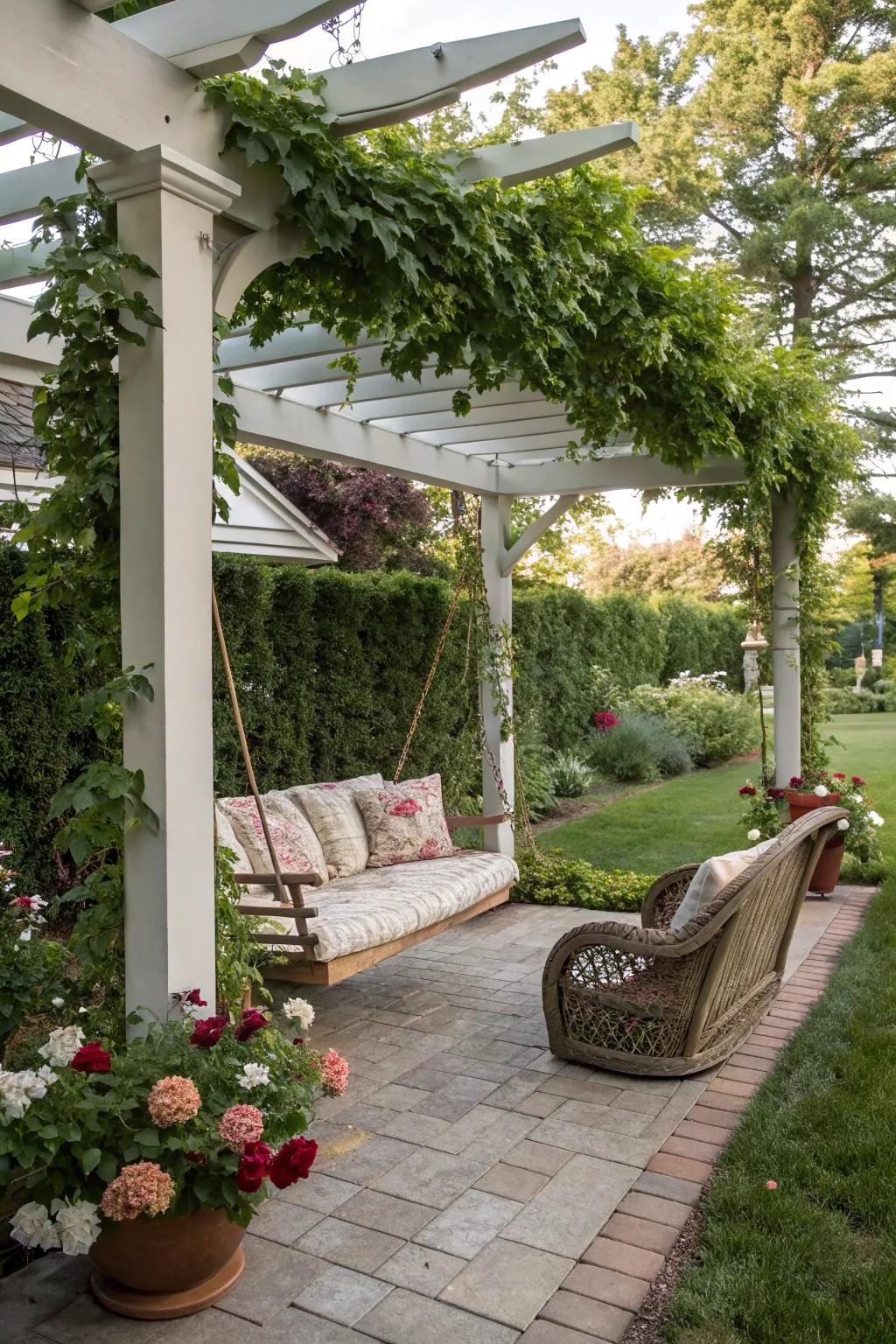 A suspended chair introduces a playful and cozy element to a small pergola.