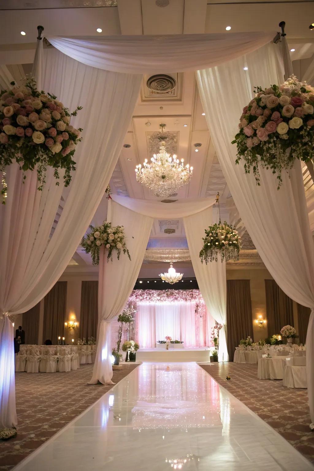 Create an unforgettable experience with textile designs and suspended blooms.