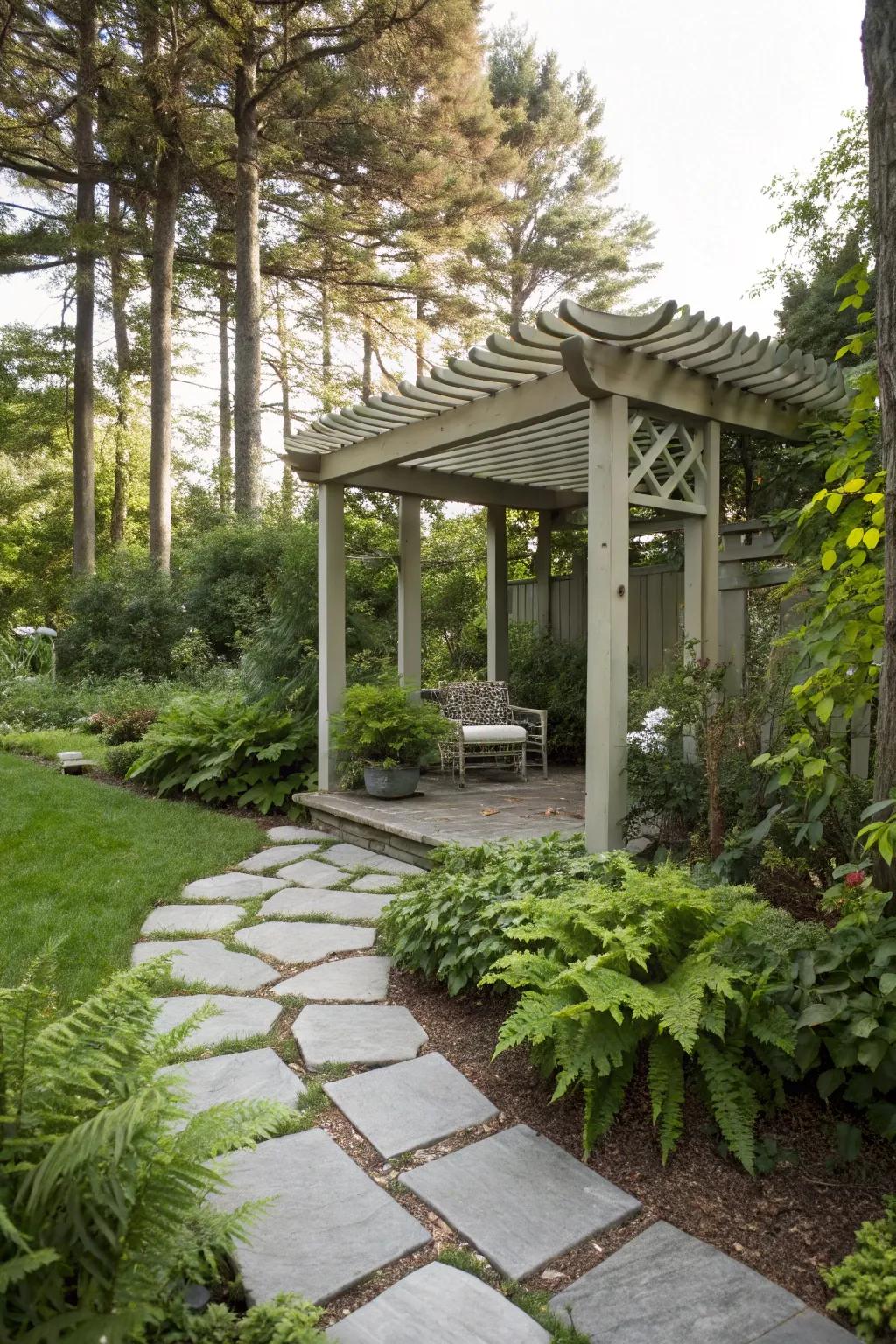 A stone walkway enhances the approach to a small pergola.