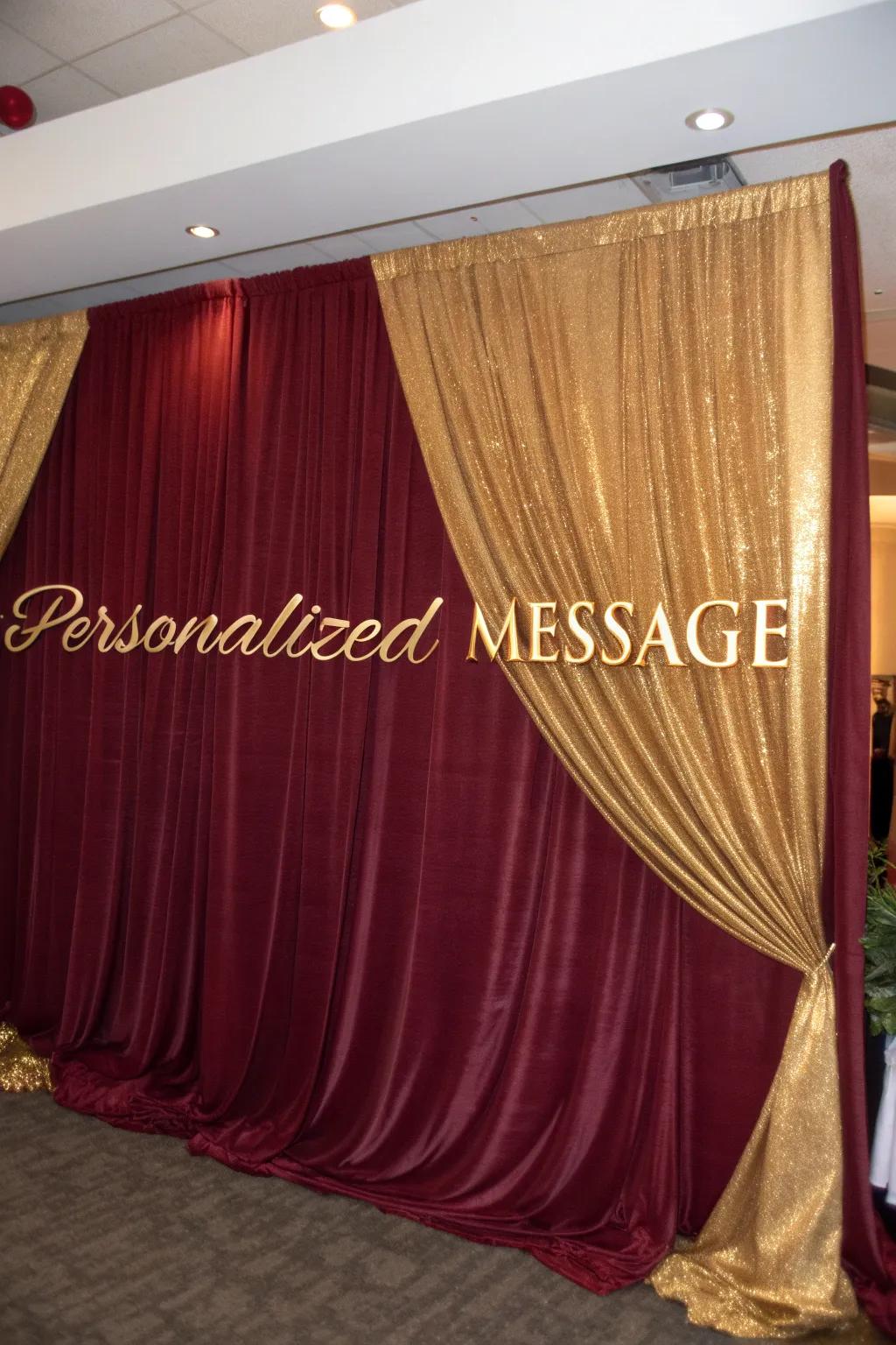 Make a statement with beautiful red and gold draped backdrops.
