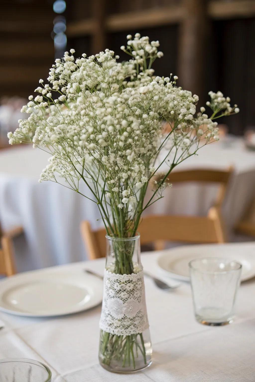 Airy delicate blooms as a centerpiece bringing simple beauty to a wedding at a great price.