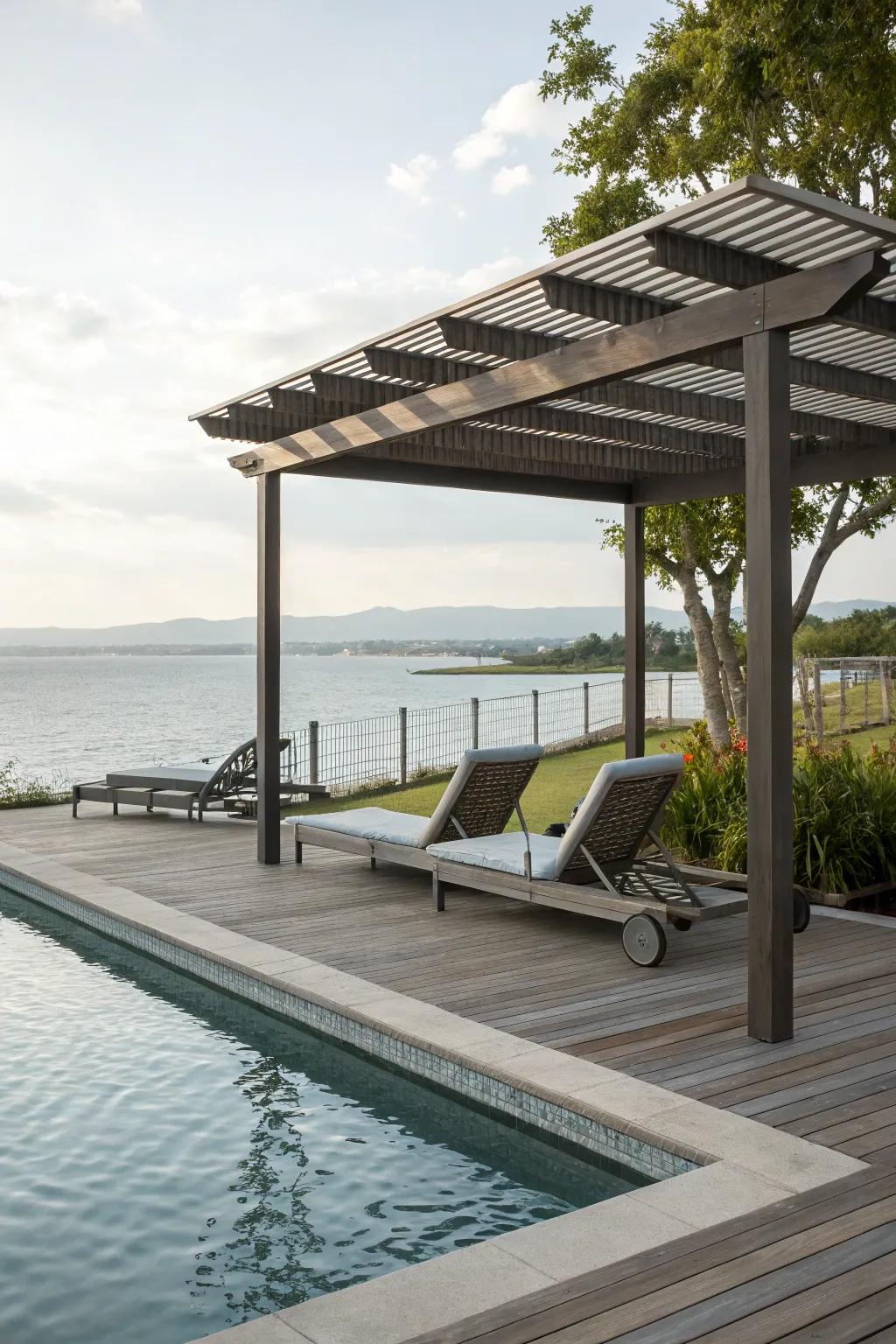 A poolside deck featuring a pergola, offering a tranquil escape.