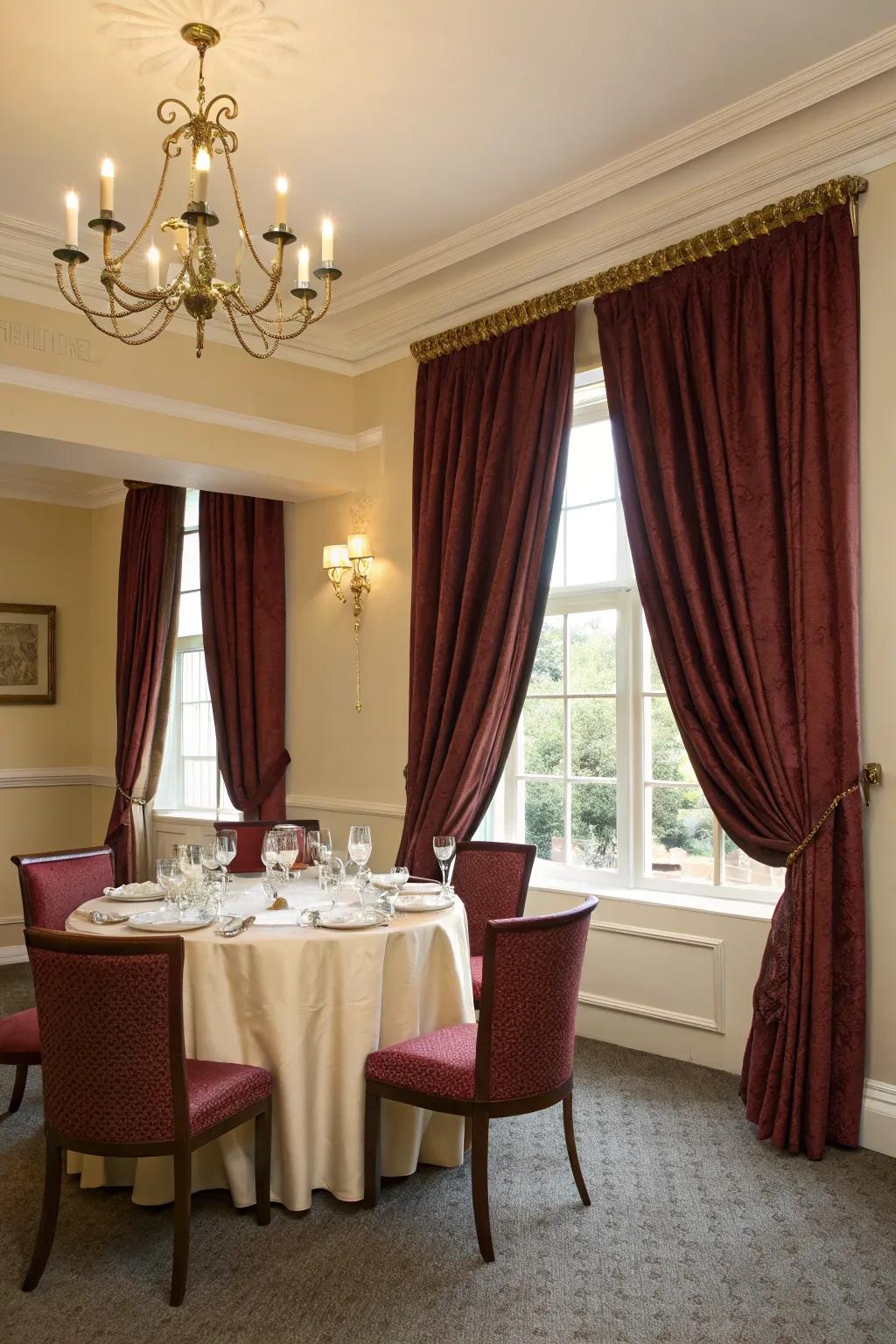 Elegant drapes adding a dramatic touch to a dining room.