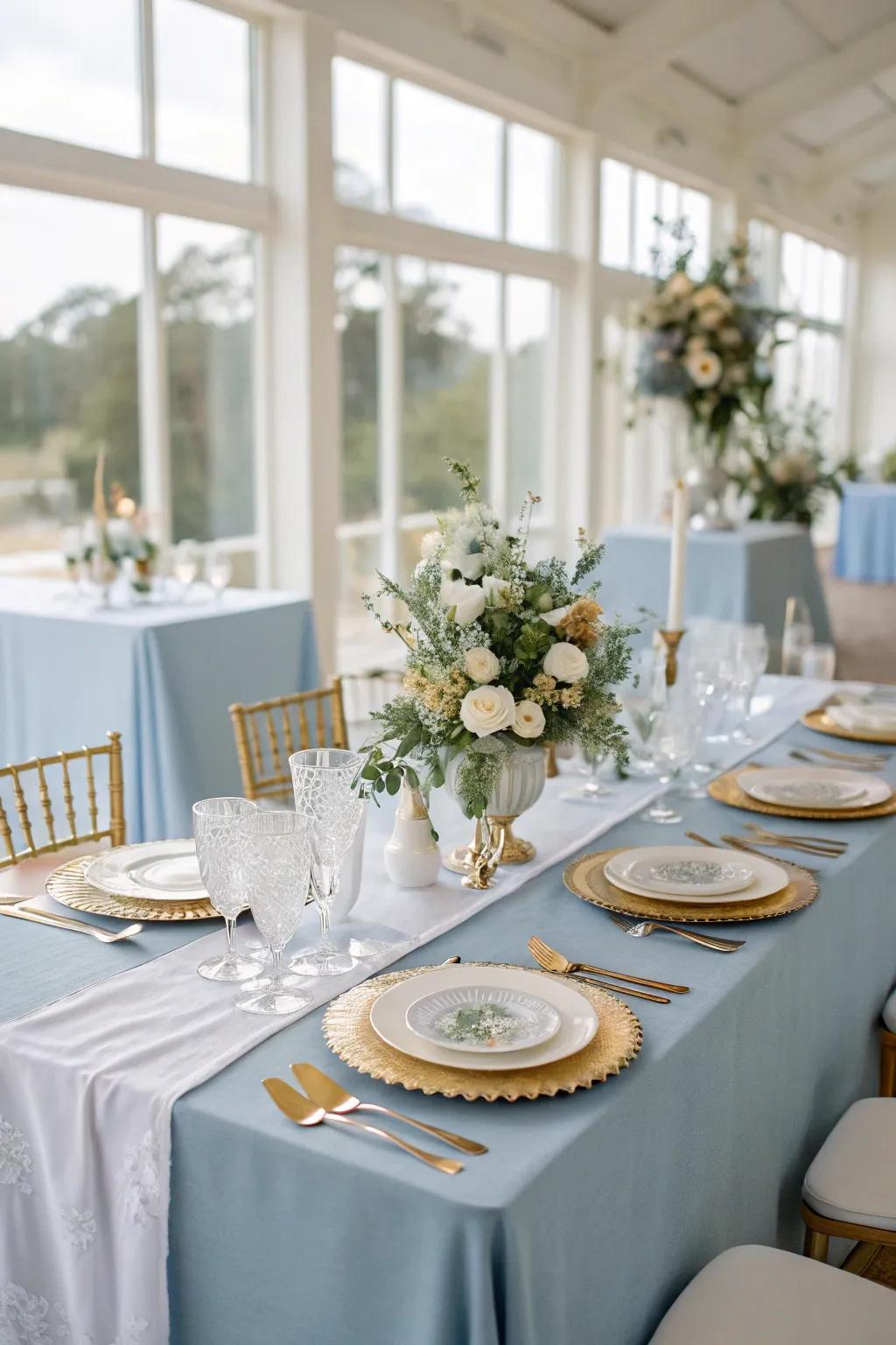 A sophisticated table setting with dusty blue elements that elevate any wedding reception.