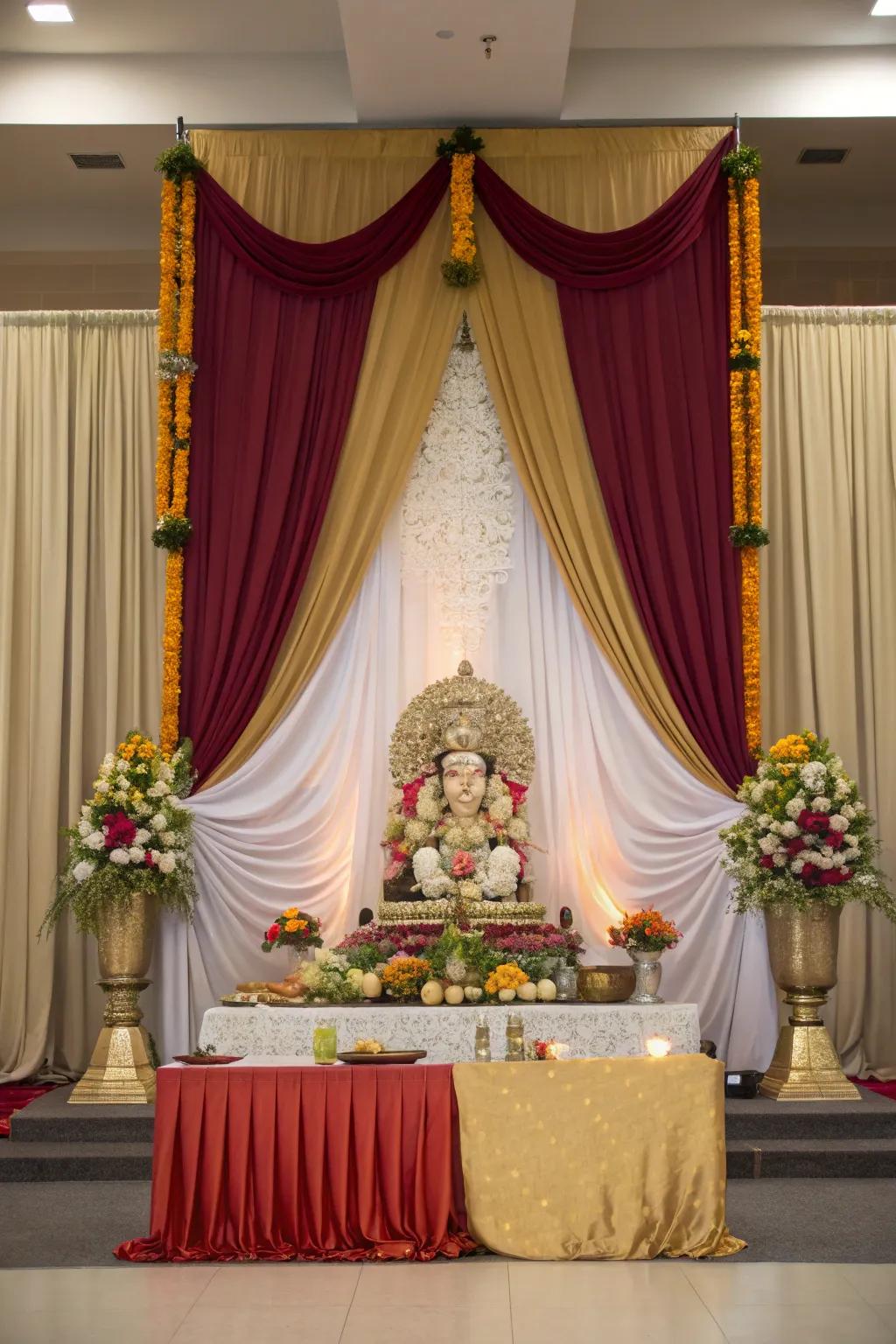 Textiles give a majestic feel to the Ganpati arrangement.