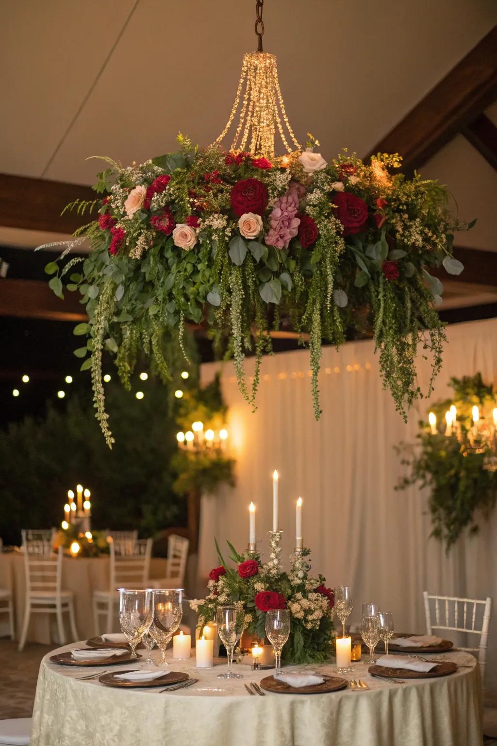 A beautiful flower light fixture adds sophistication to a wedding reception.