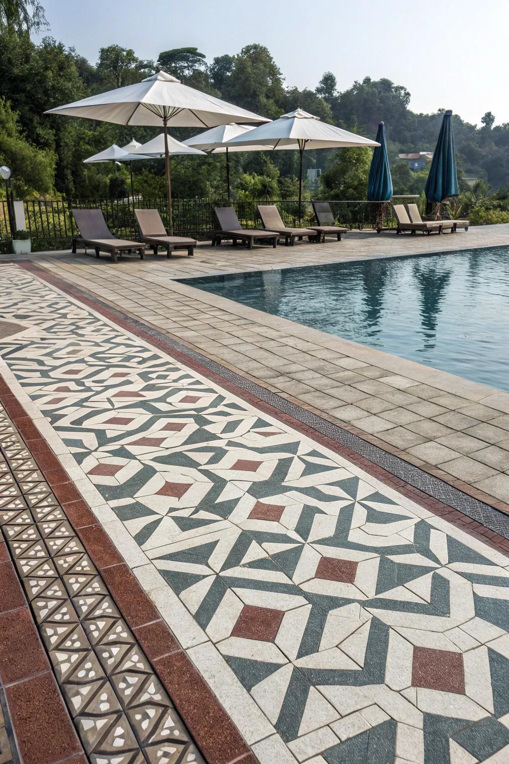 Geometric pattern pavers introduce a modern, artistic element to this pool deck.
