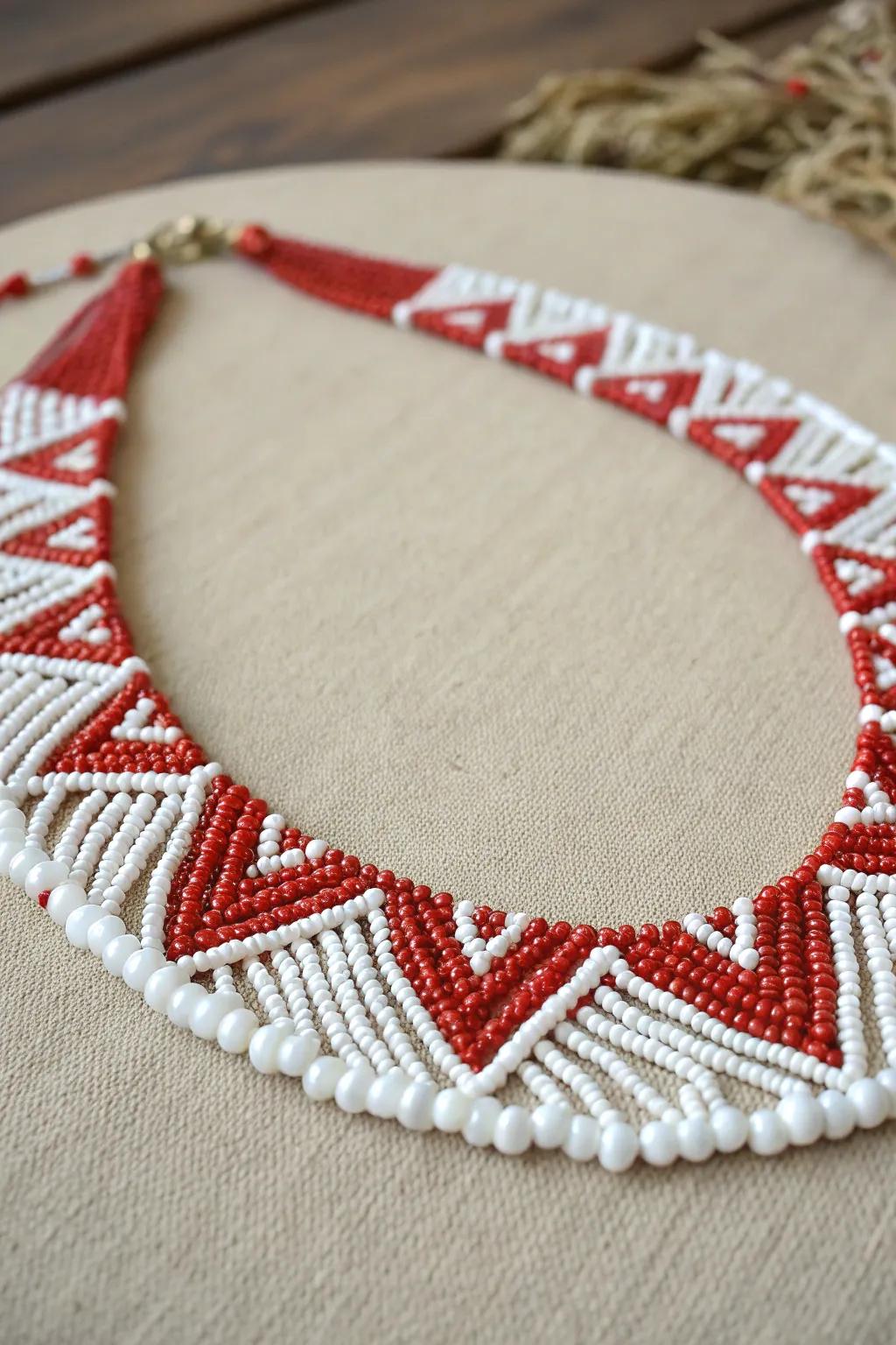 Revamp your look with a scarlet and ivory sphere pendant.