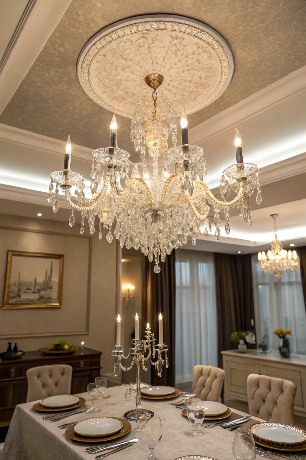 A dining room where an impressive pendant introduces elegance to a tray ceiling.