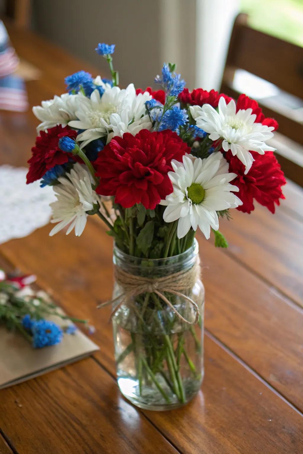 Patriotic flowers simply arranged in a preserving jar.
