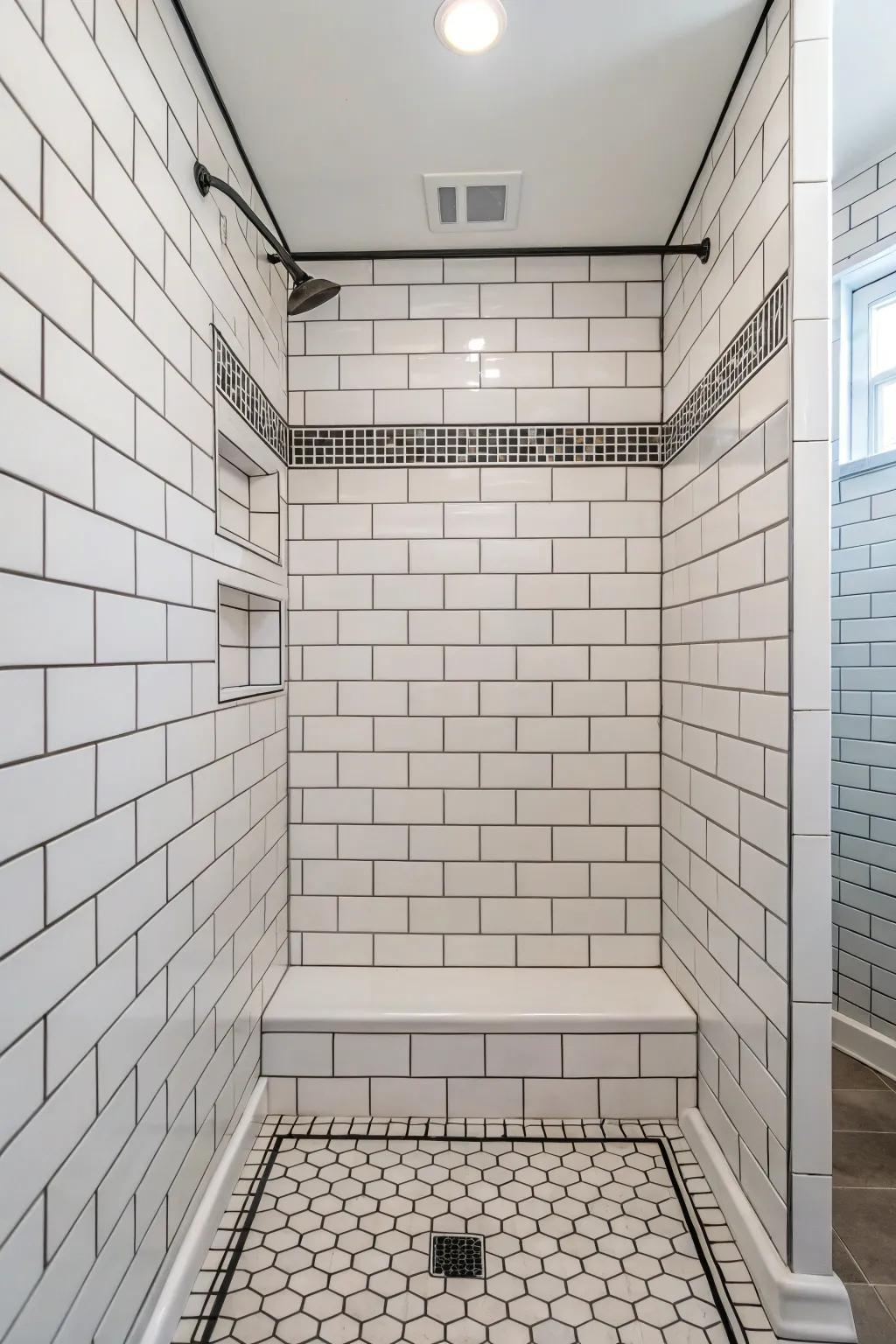 Traditional white brick-style tiles in a shower showcasing contrasting grout lines.