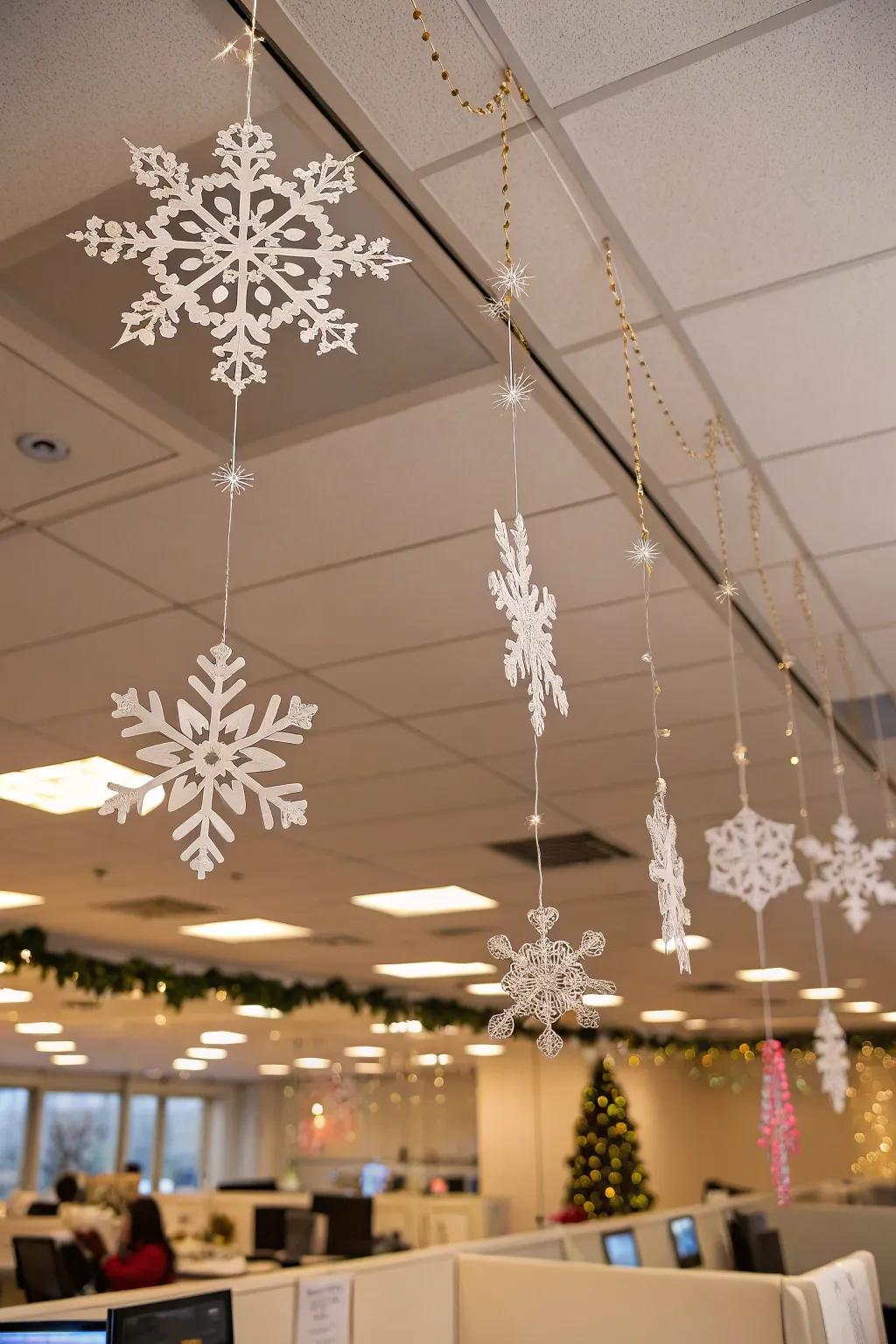 Snowflakes hang from the roof, bringing a touch of winter magic to the workplace.