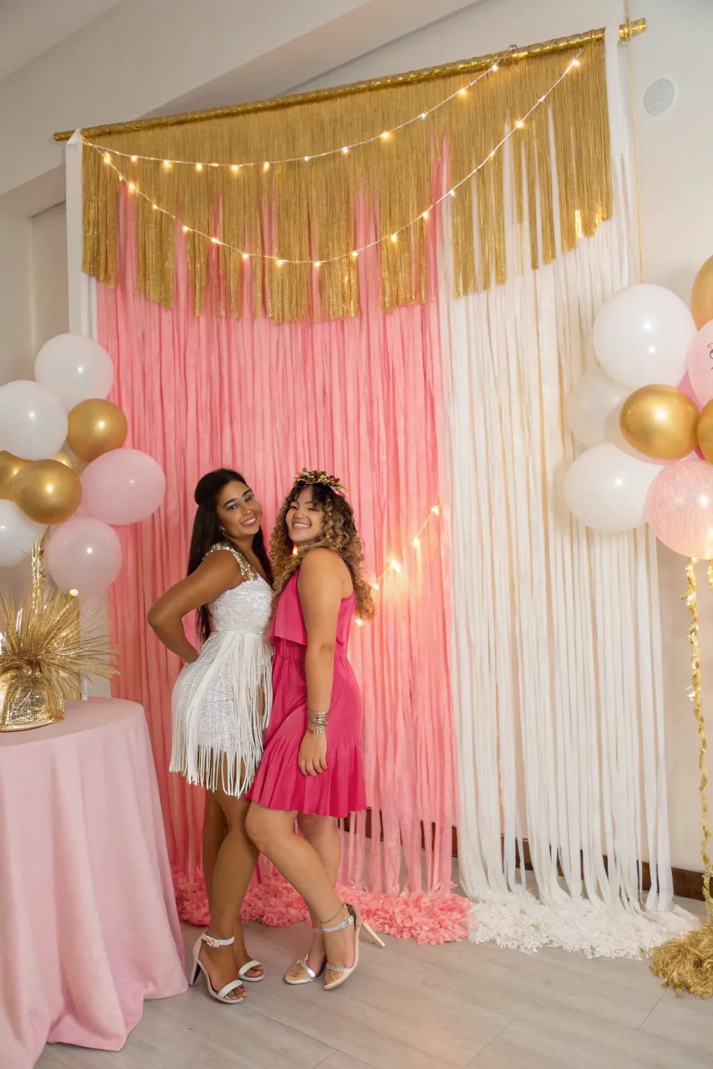 A striking tassel backdrop in rose, gold, and ivory.