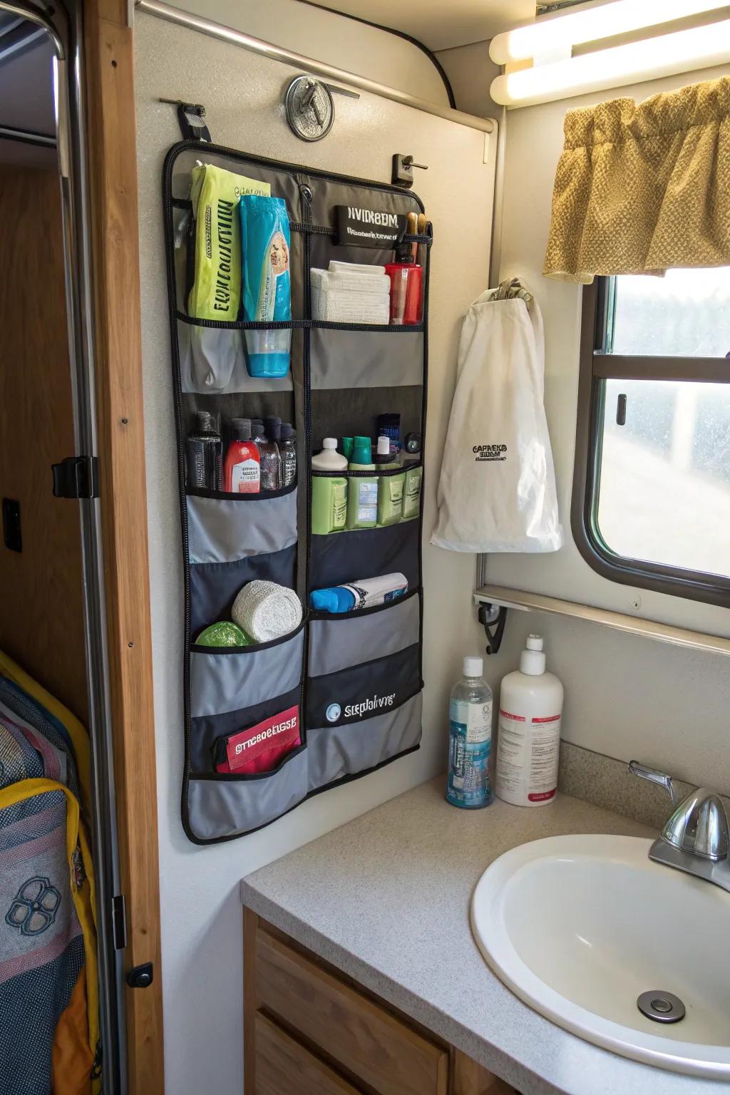 Over-the-door organizer maximizing unused space in a camper bathroom.