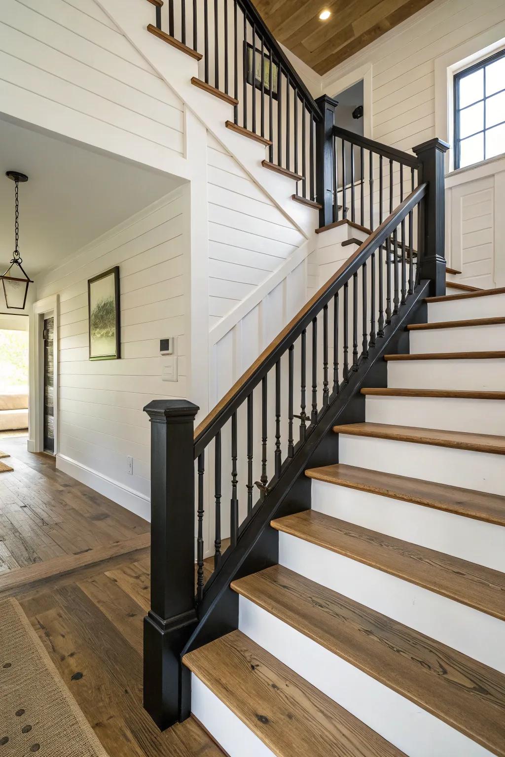 Black-painted banisters provide a striking contrast in farmhouse interiors.