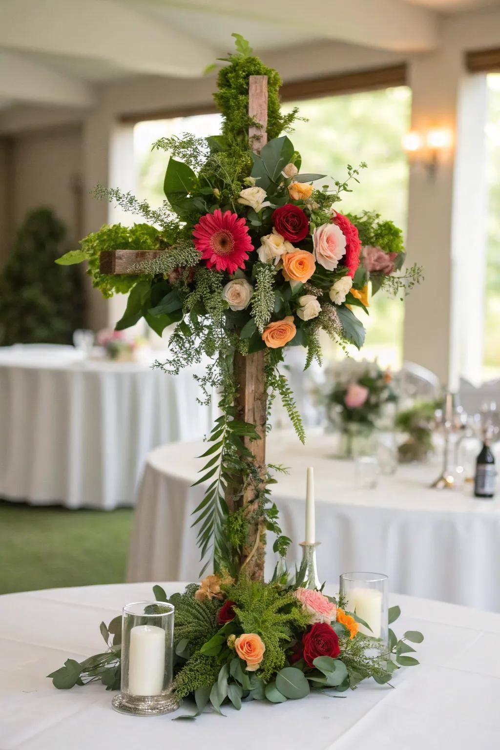 A floral cross centerpiece provides an elegant and meaningful focal point on the table.