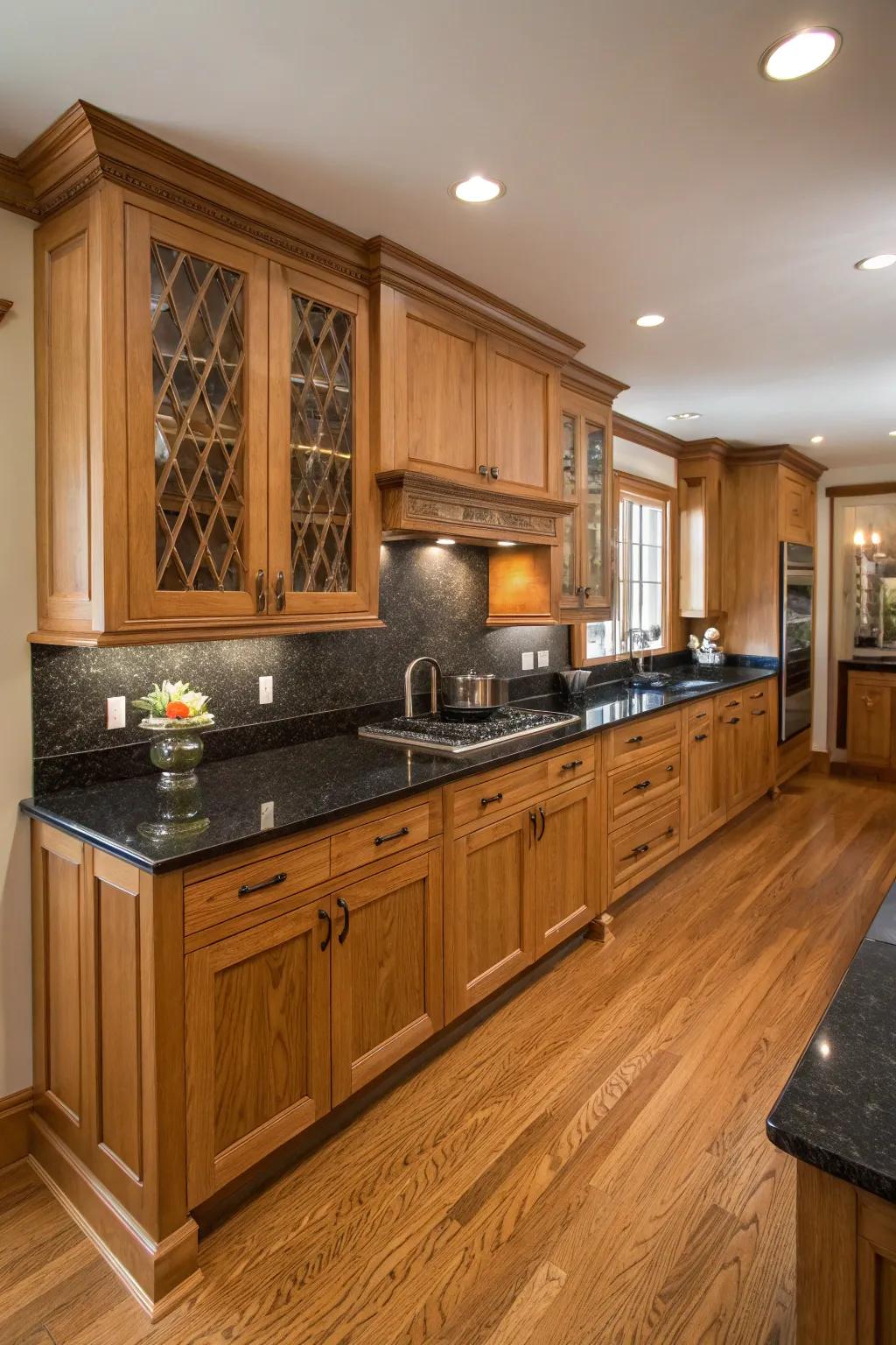 Dark countertops introduce an elegant contrast to oak cabinetry.