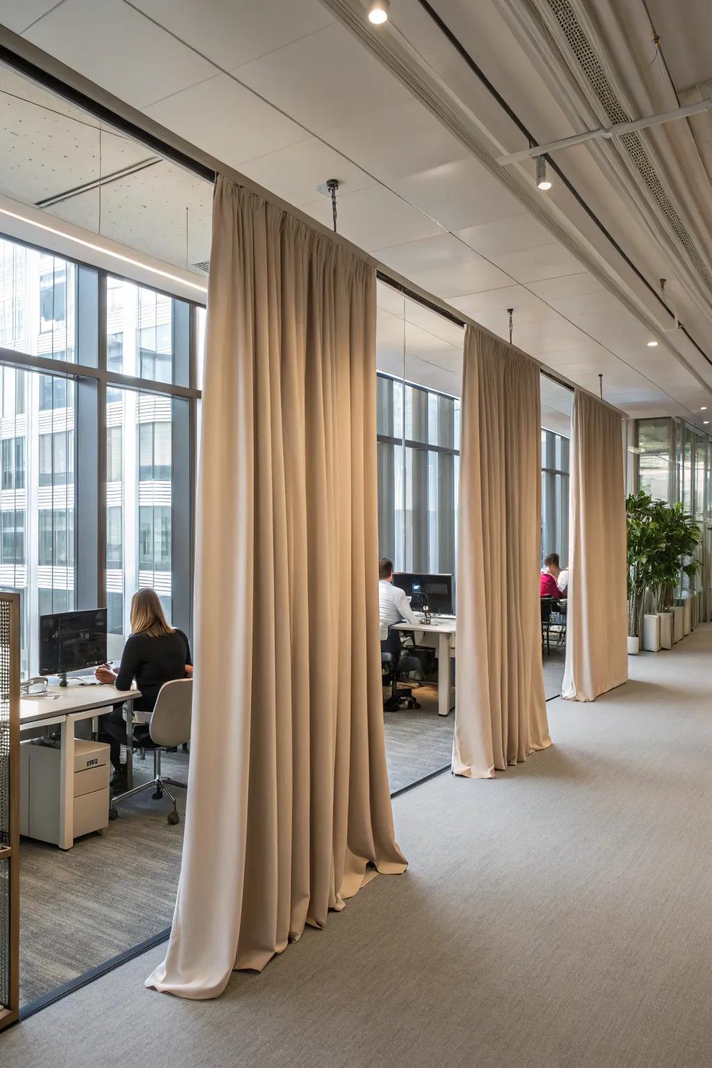 Textile separations contribute gentleness and adaptability to office layouts.