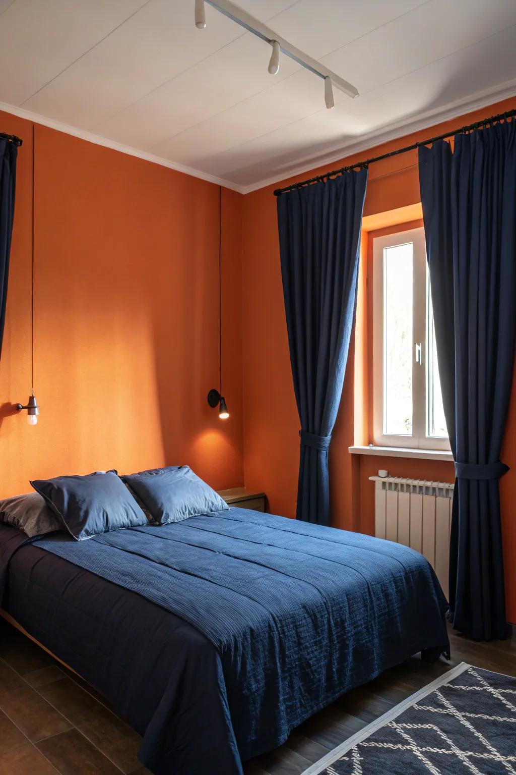 Sapphire accents offer a relaxing contrast to bold orange walls.