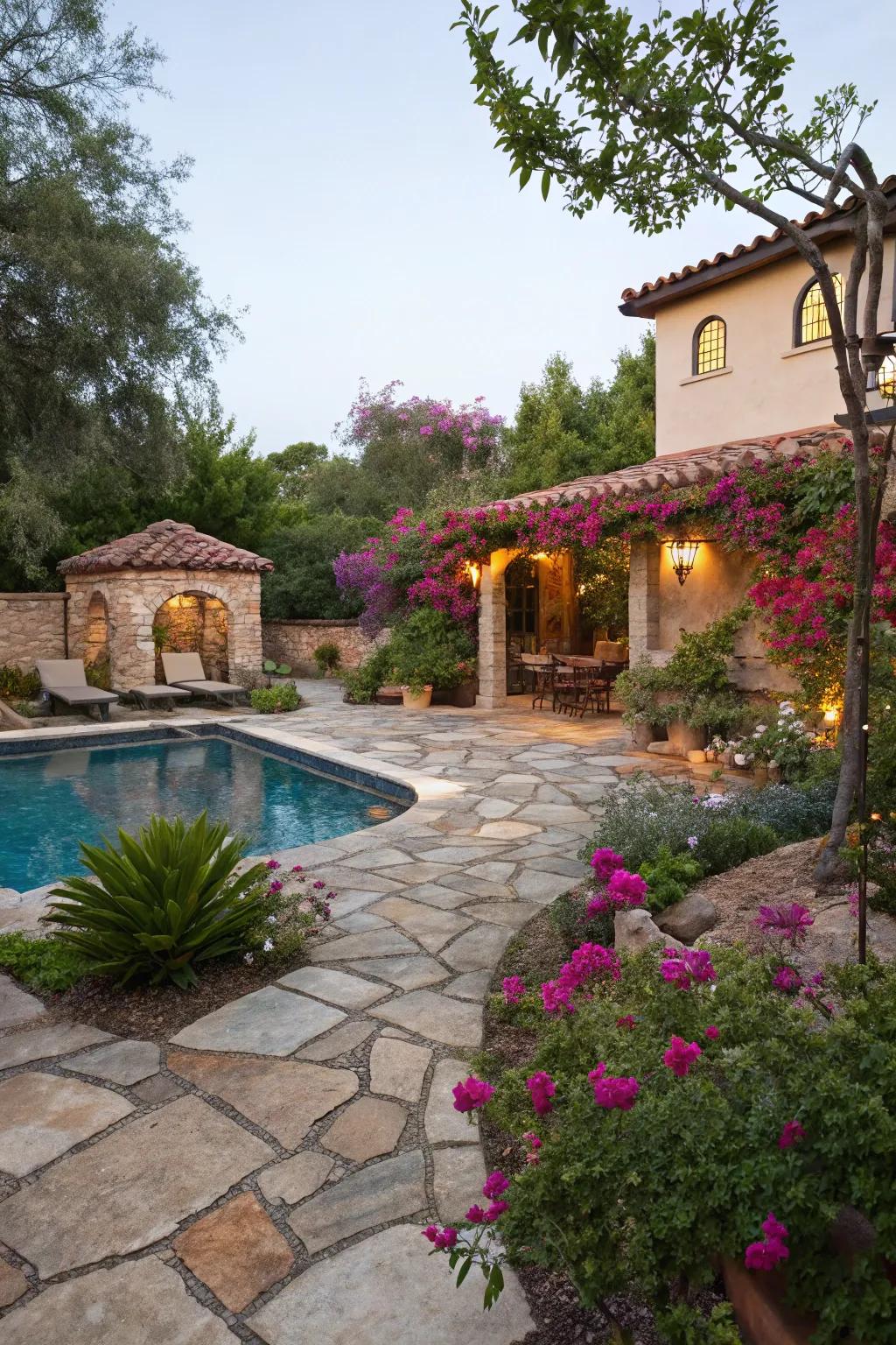 Natural stone patios add rustic charm to this Spanish-style pool area.