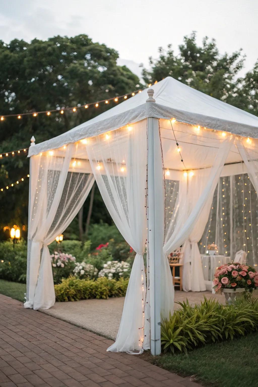 A dreamy white tent setup perfect for an outdoor celebration.