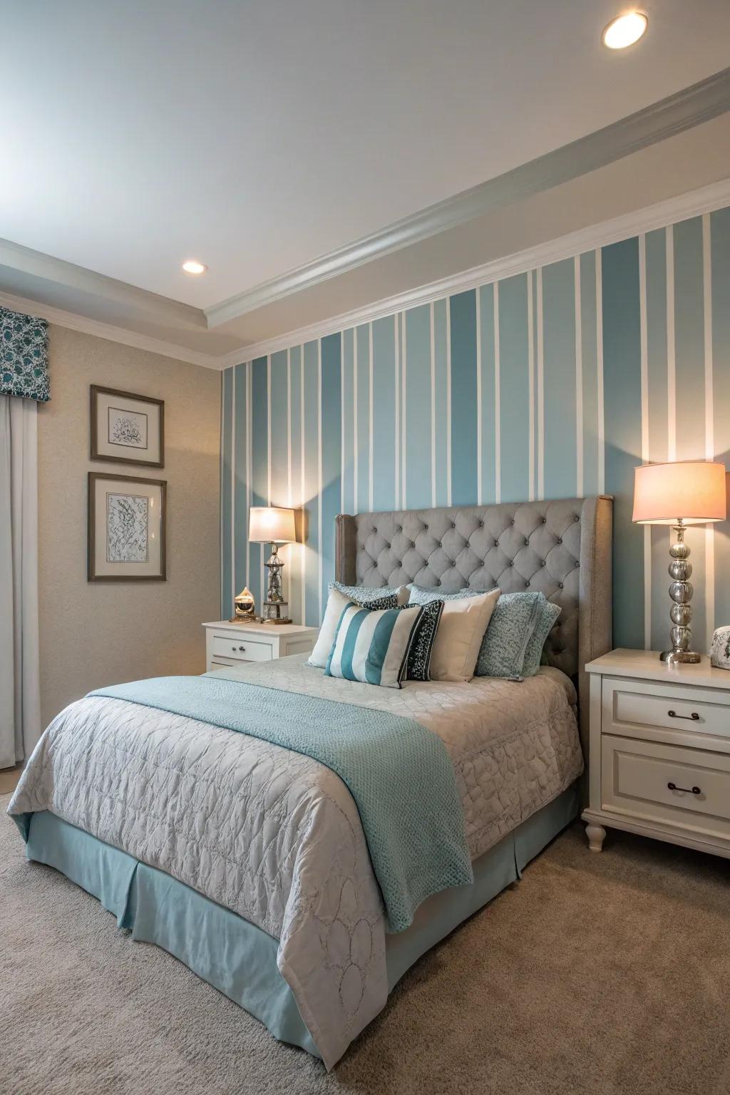 Striped walls bring elegance to this versatile bedroom.