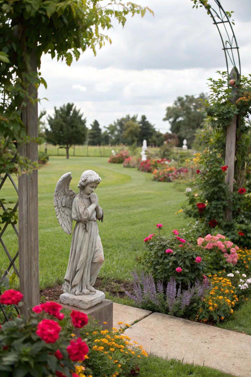 A serene angel statue adds a comforting presence to the memorial garden.