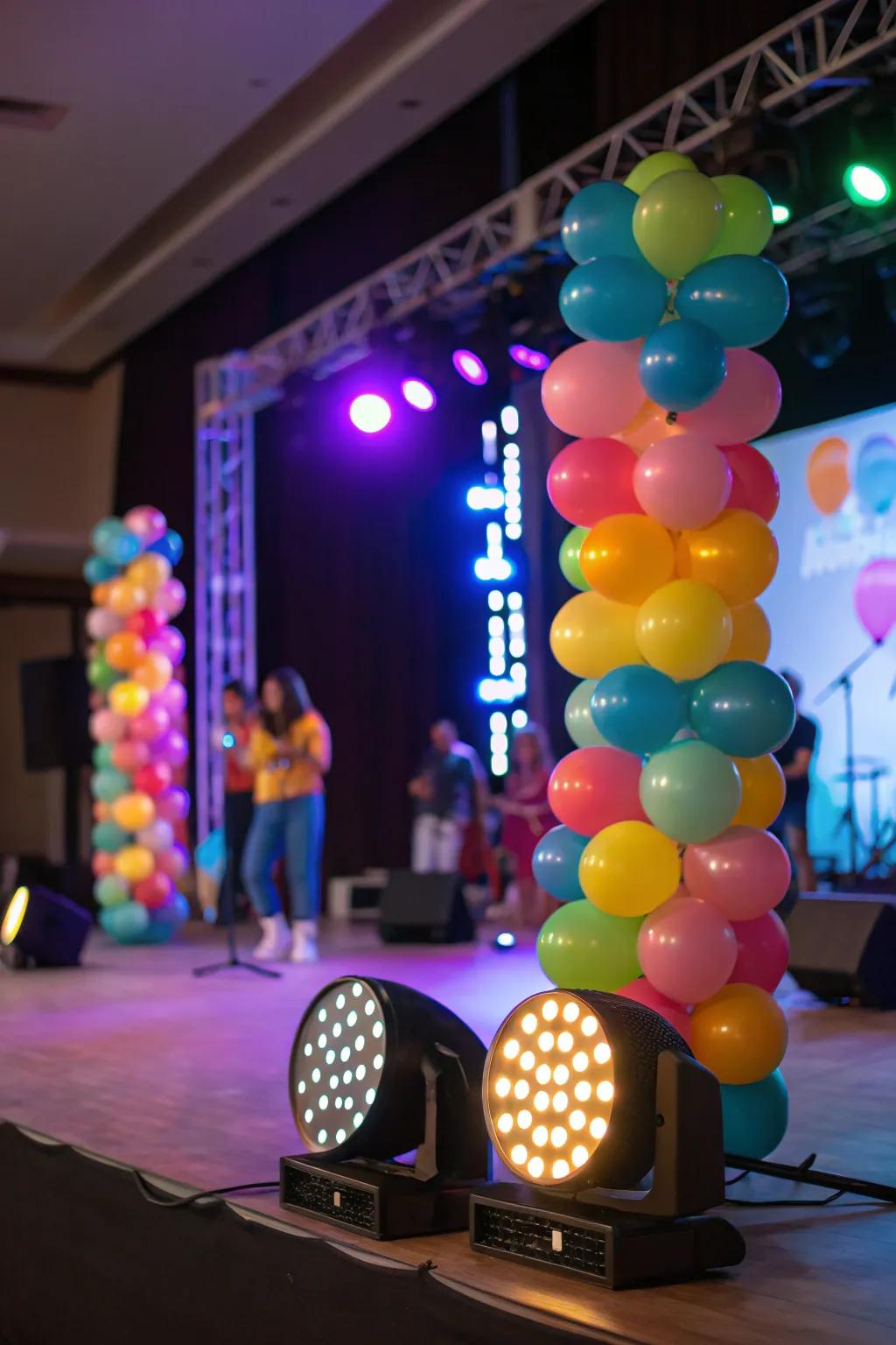 Balloons with LED lights creating a stunning visual effect on stage.