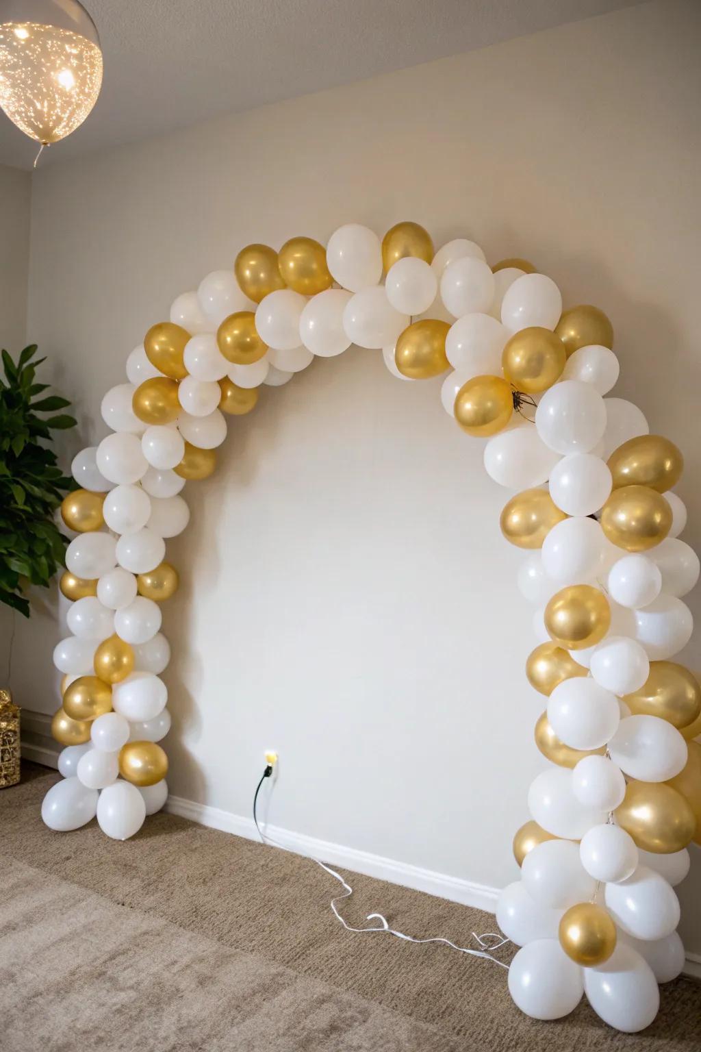 A chic minimalist balloon arch using a monochrome palette.