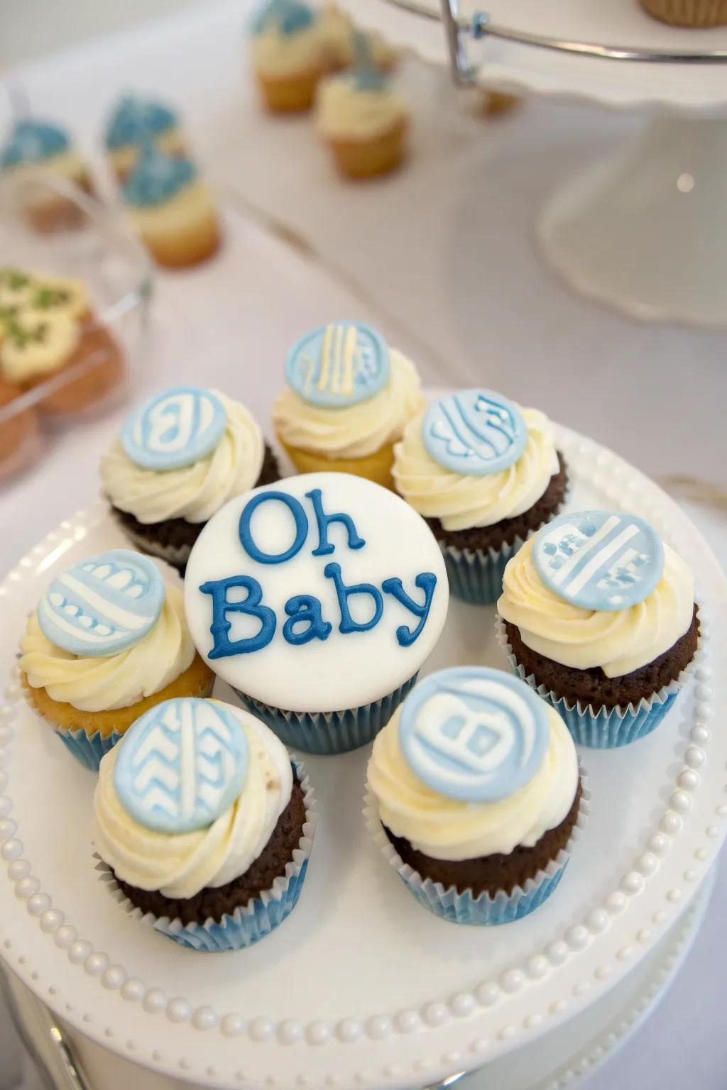 Cupcakes featuring 'Welcome Baby' script for a celebratory atmosphere.