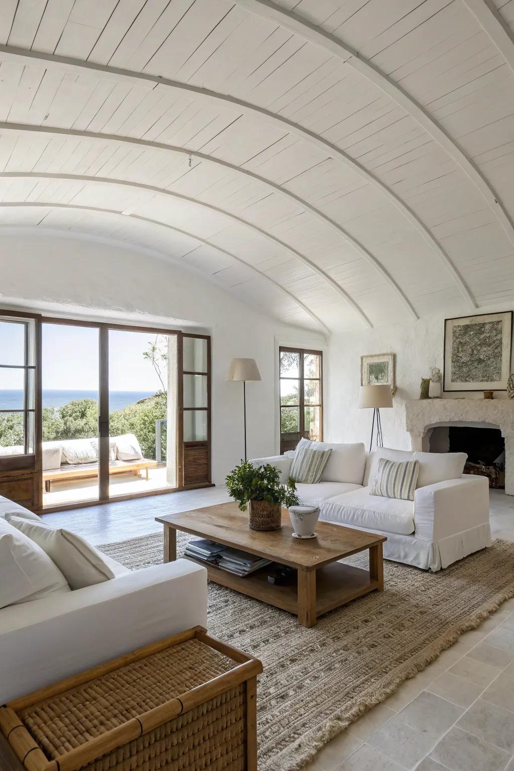 A modern minimalist living room featuring a sleek vaulted ceiling.