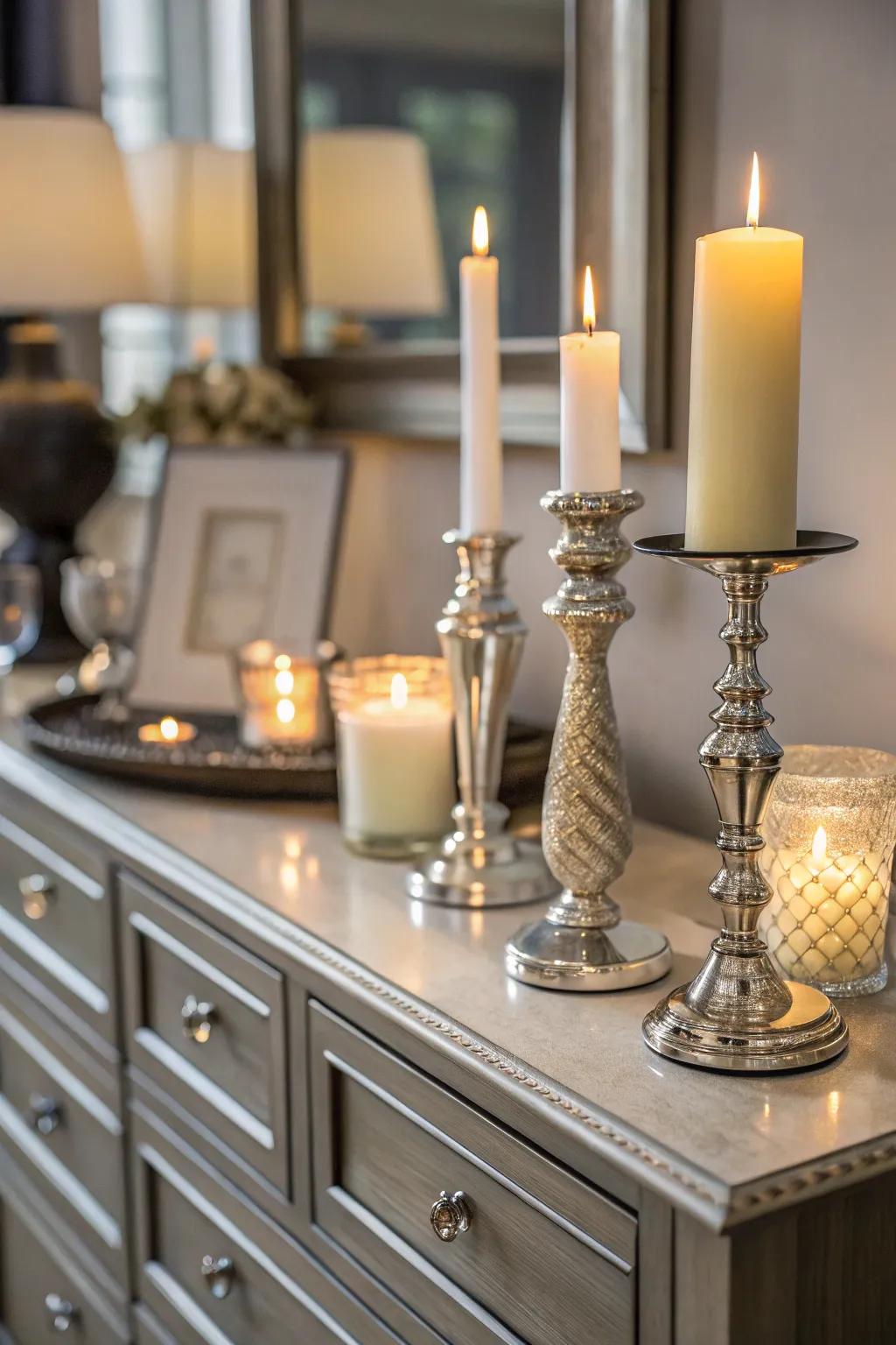 Candles add warmth and sophistication to the dresser's decor.