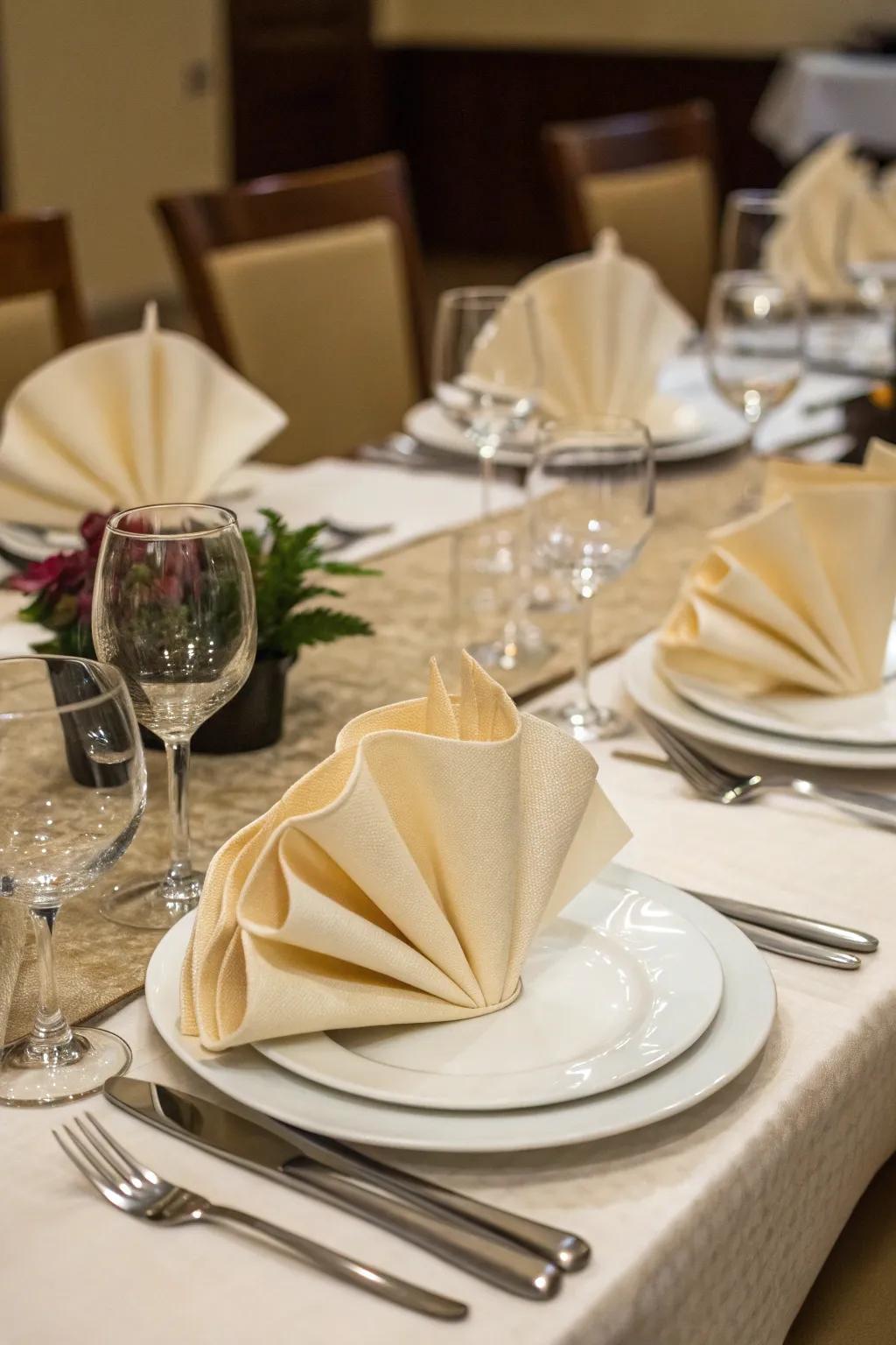 Imaginatively folded napkins add a personal flourish to the table.