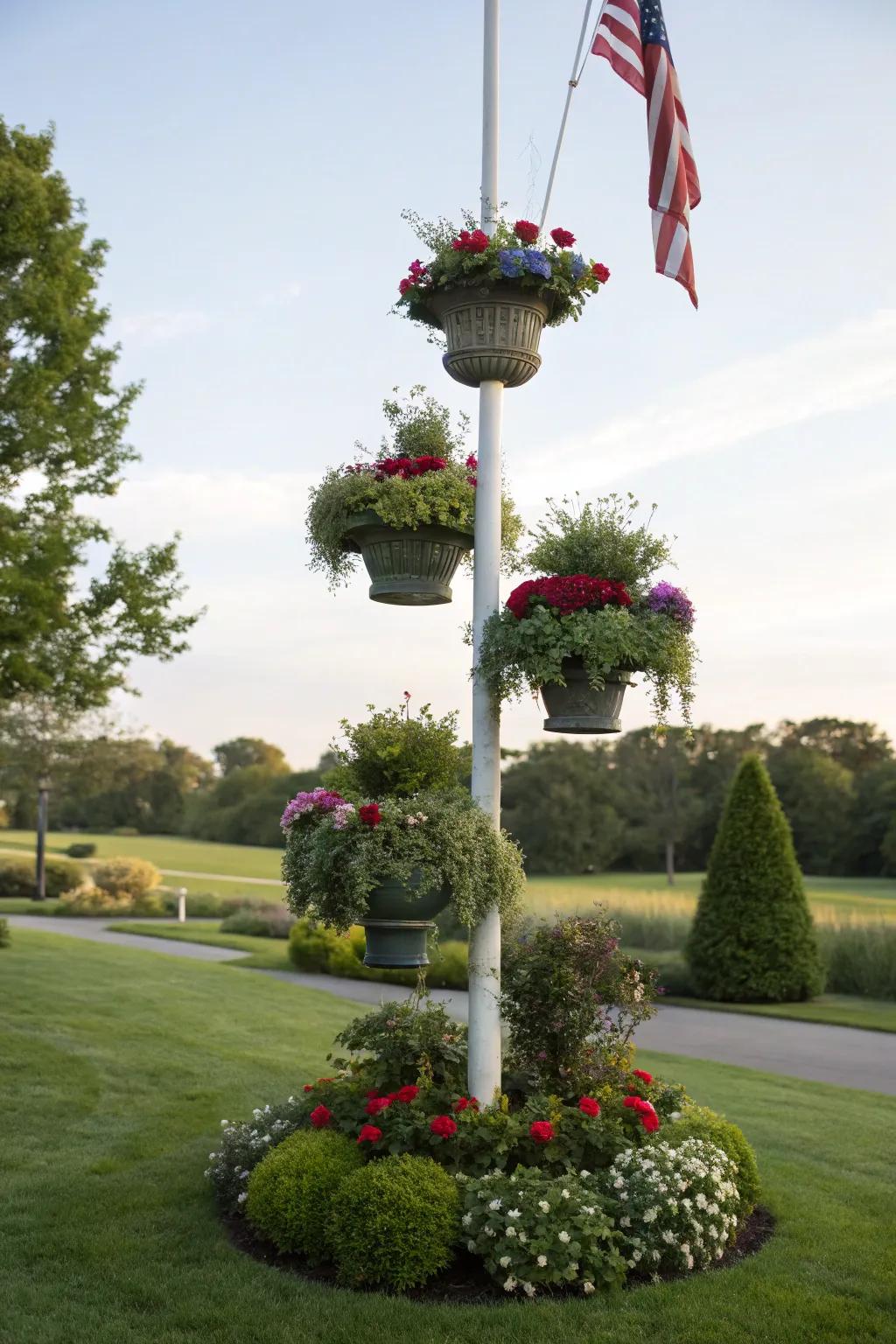 Tiered plants contribute dimension and beauty to flagpole landscaping.